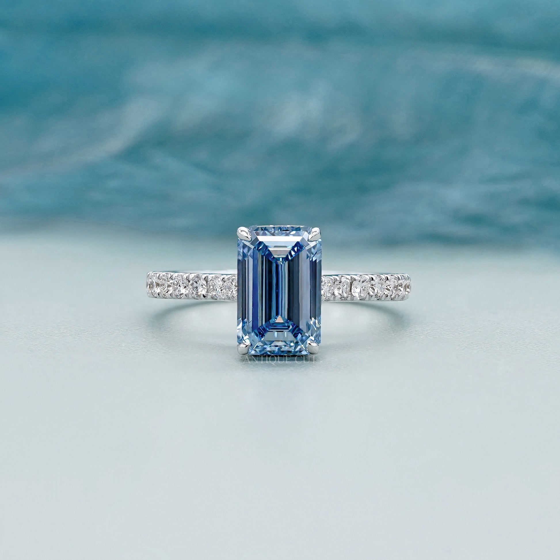 Fancy Blue 2.40tcw Emerald Cut Lab Diamond Engagement Ring | IGI Certified | White Gold Pave Setting