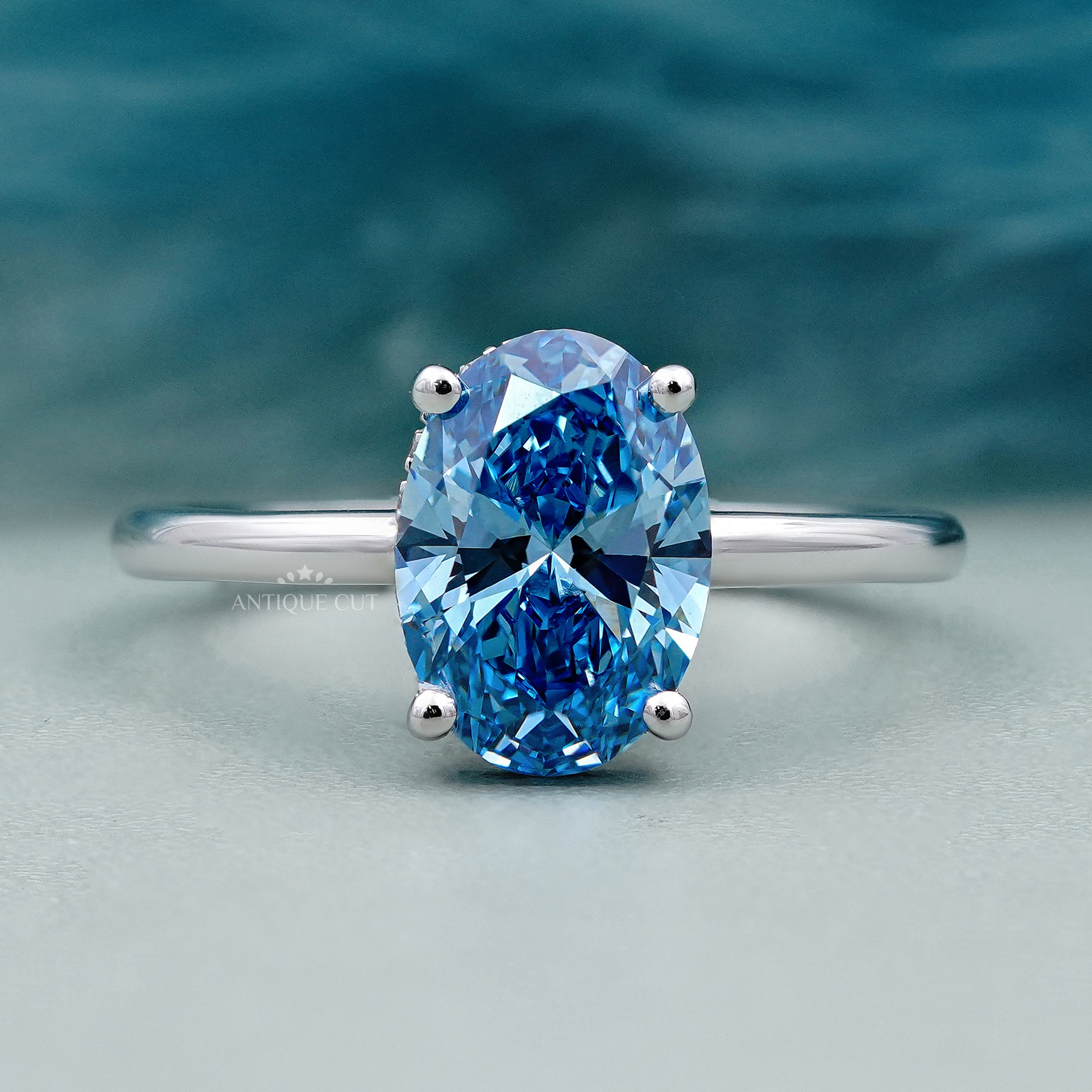 Fancy Blue Diamond Solitaire Ring | Hidden Halo Oval Engagement Ring | IGI Certified