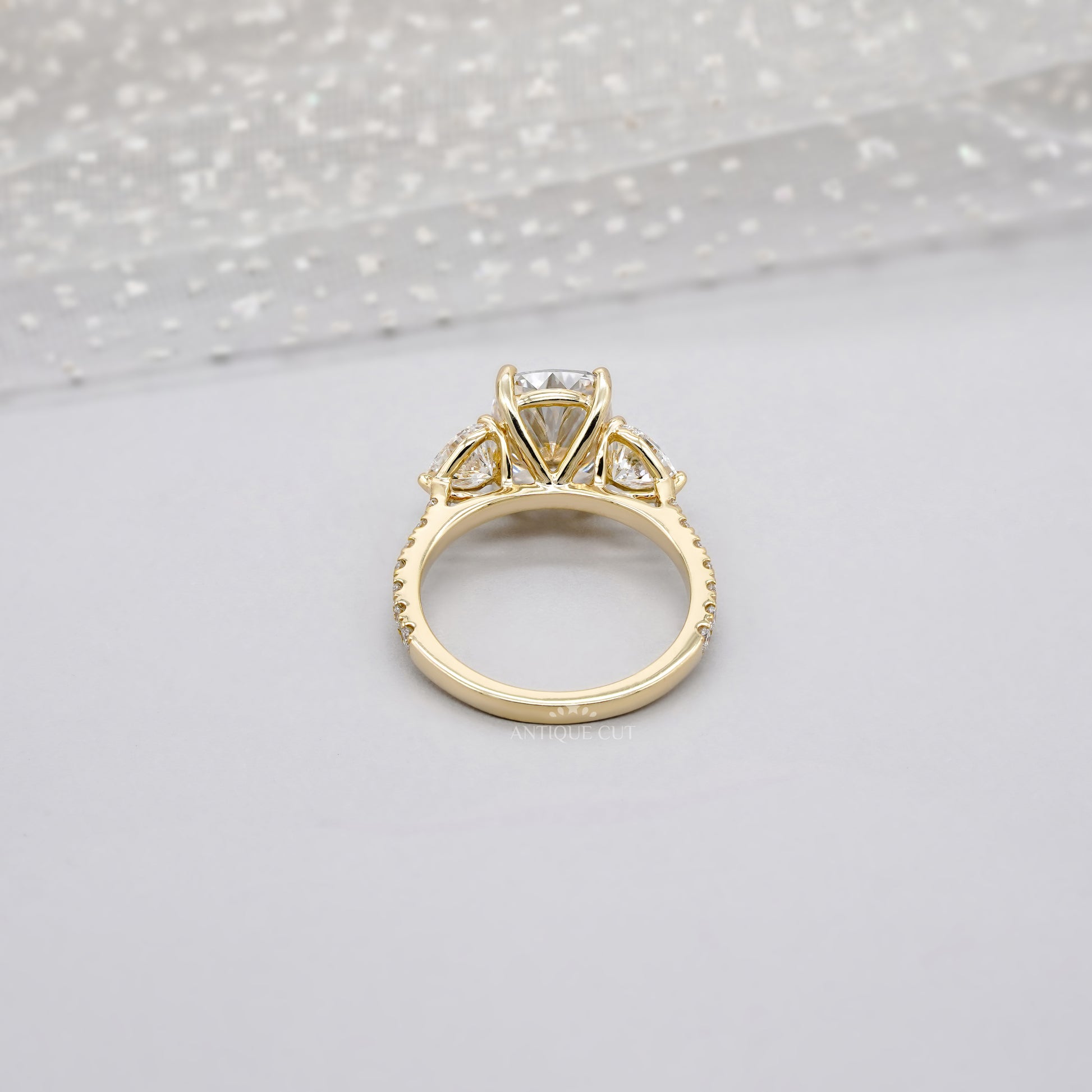 Cushion 3.90tcw Lab-Grown Diamond Three-Stone Ring | Heart & Round Side Stones | Yellow Gold