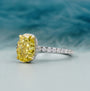 Diamond ring with a yellow gemstone