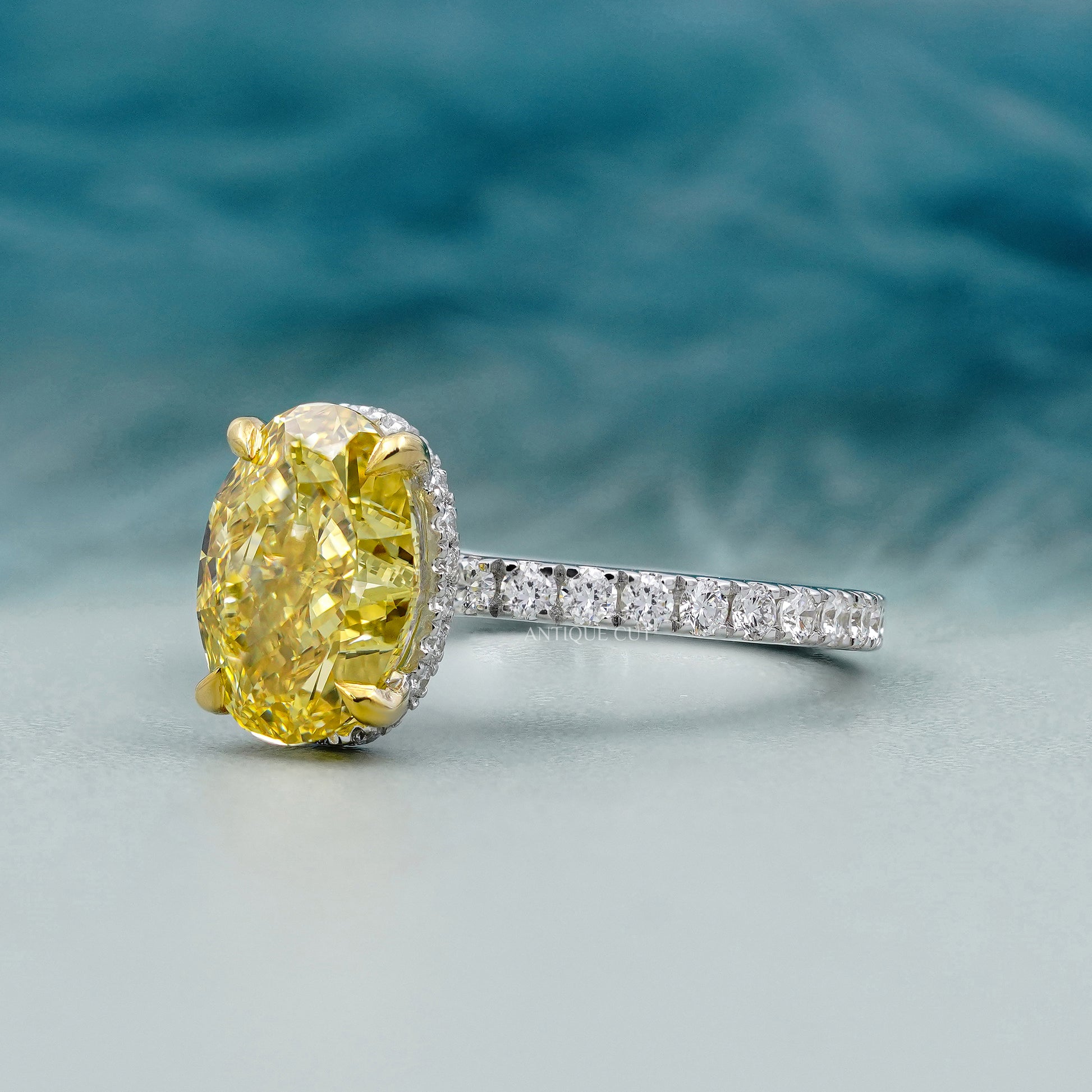 Diamond ring with a yellow gemstone