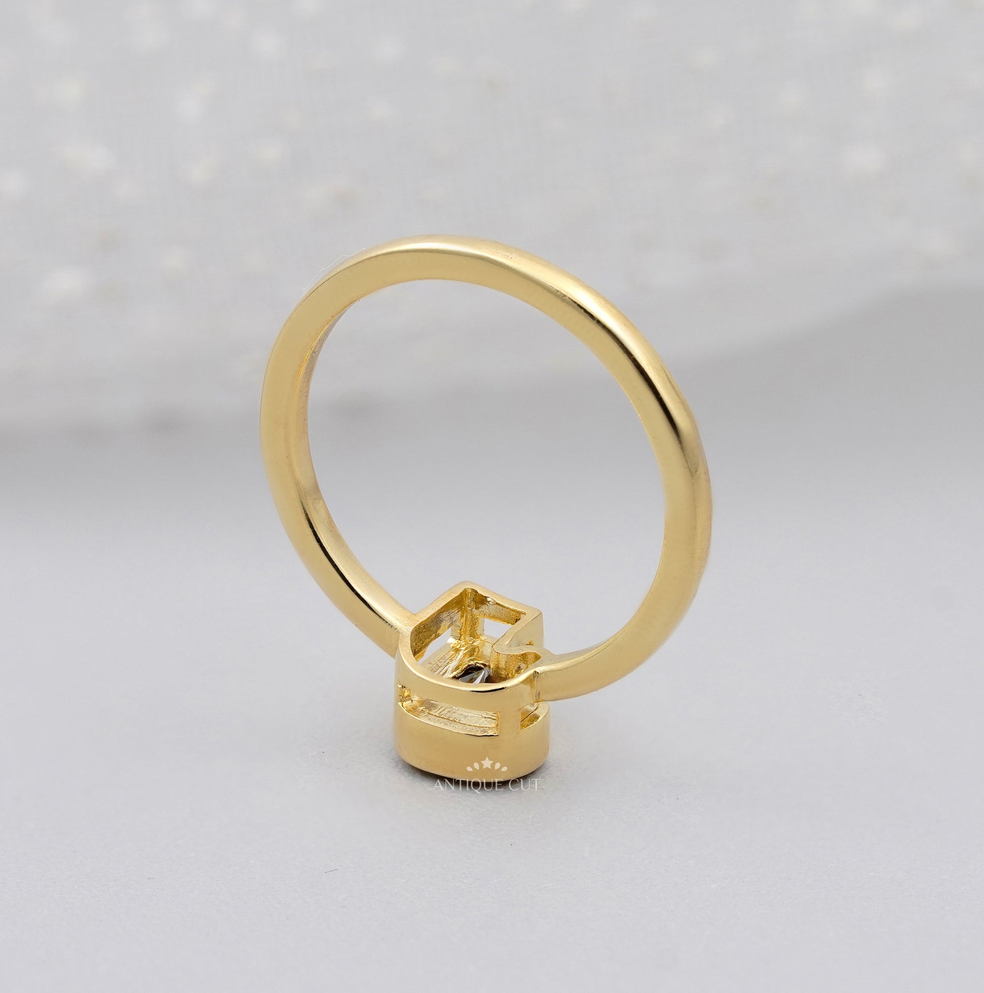 Lab grown diamond J letter ring with bezel setting in polished yellow gold