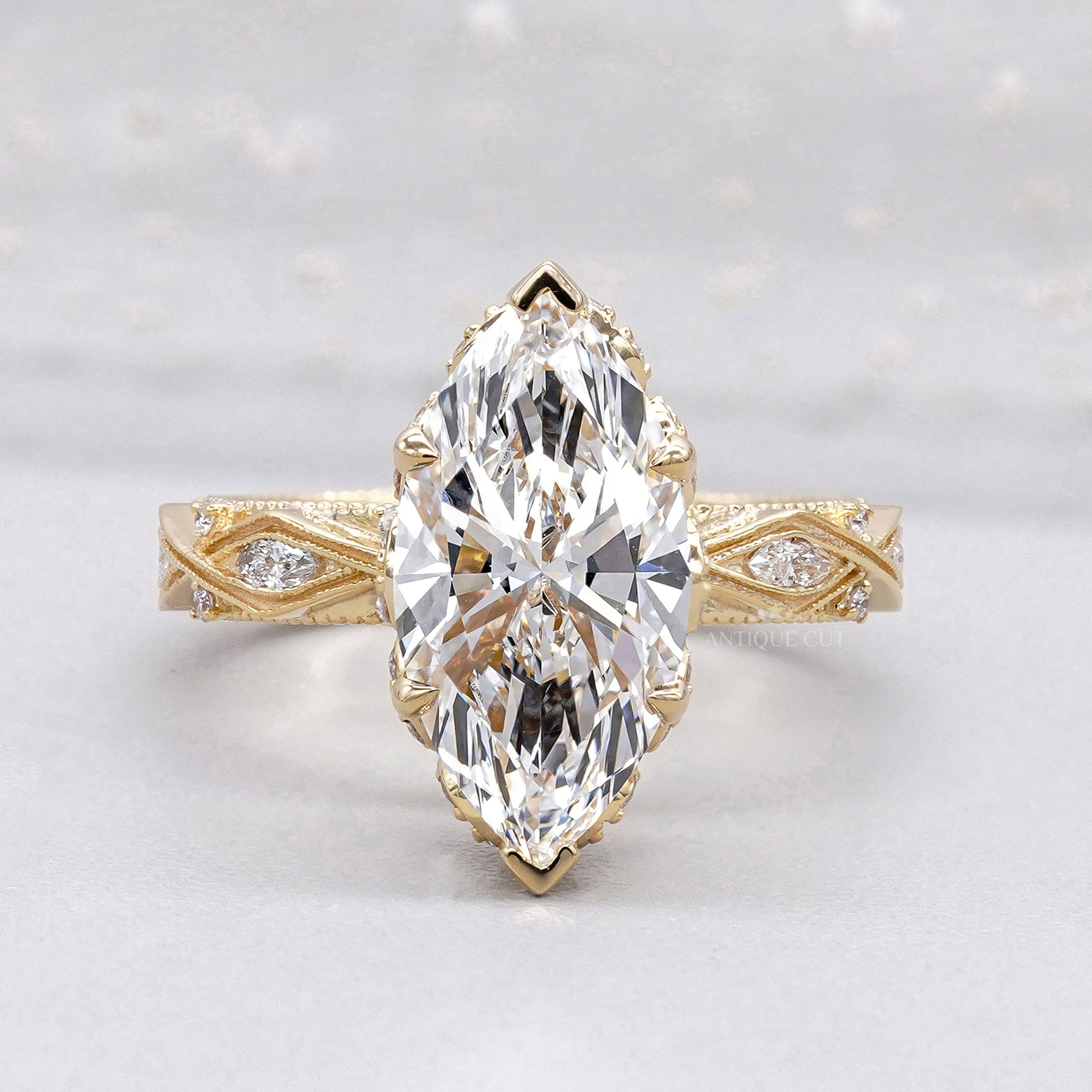 Marquise cut hidden halo engagement ring