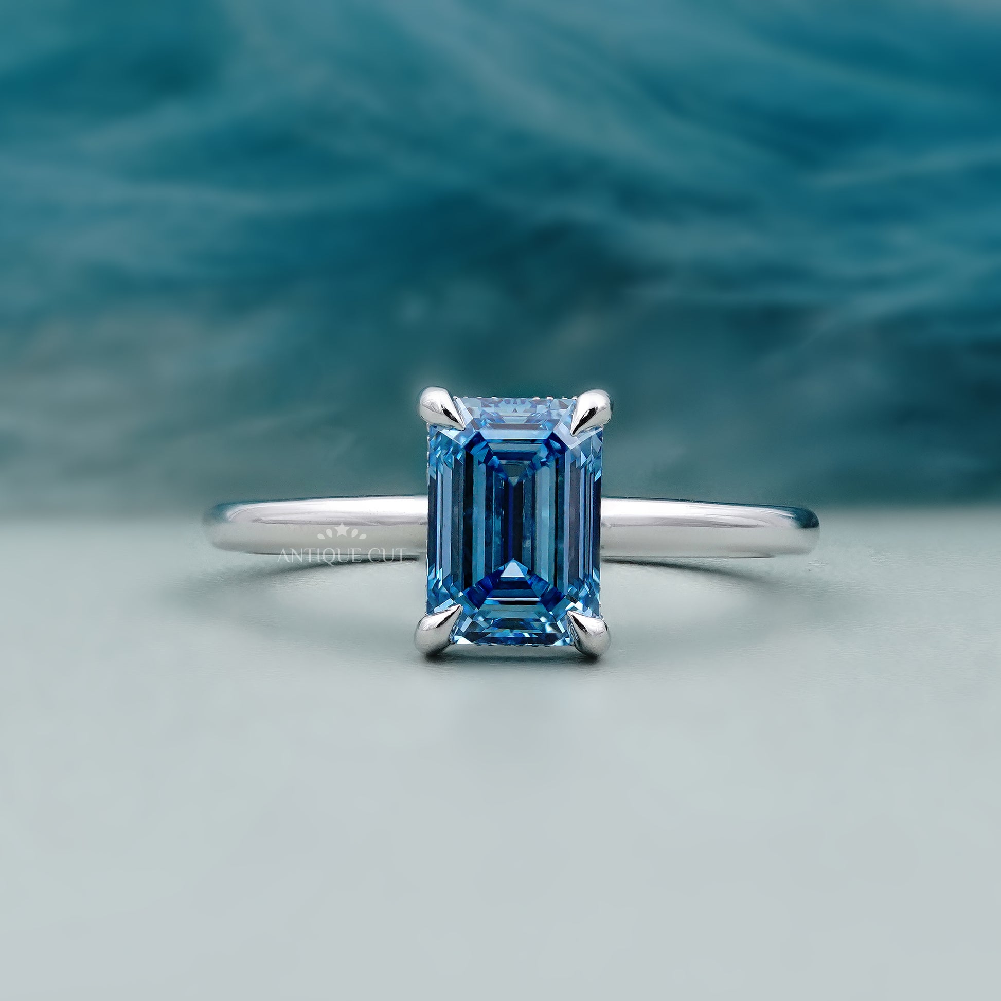 Blue diamond ring emerald solitaire 4 prong white gold