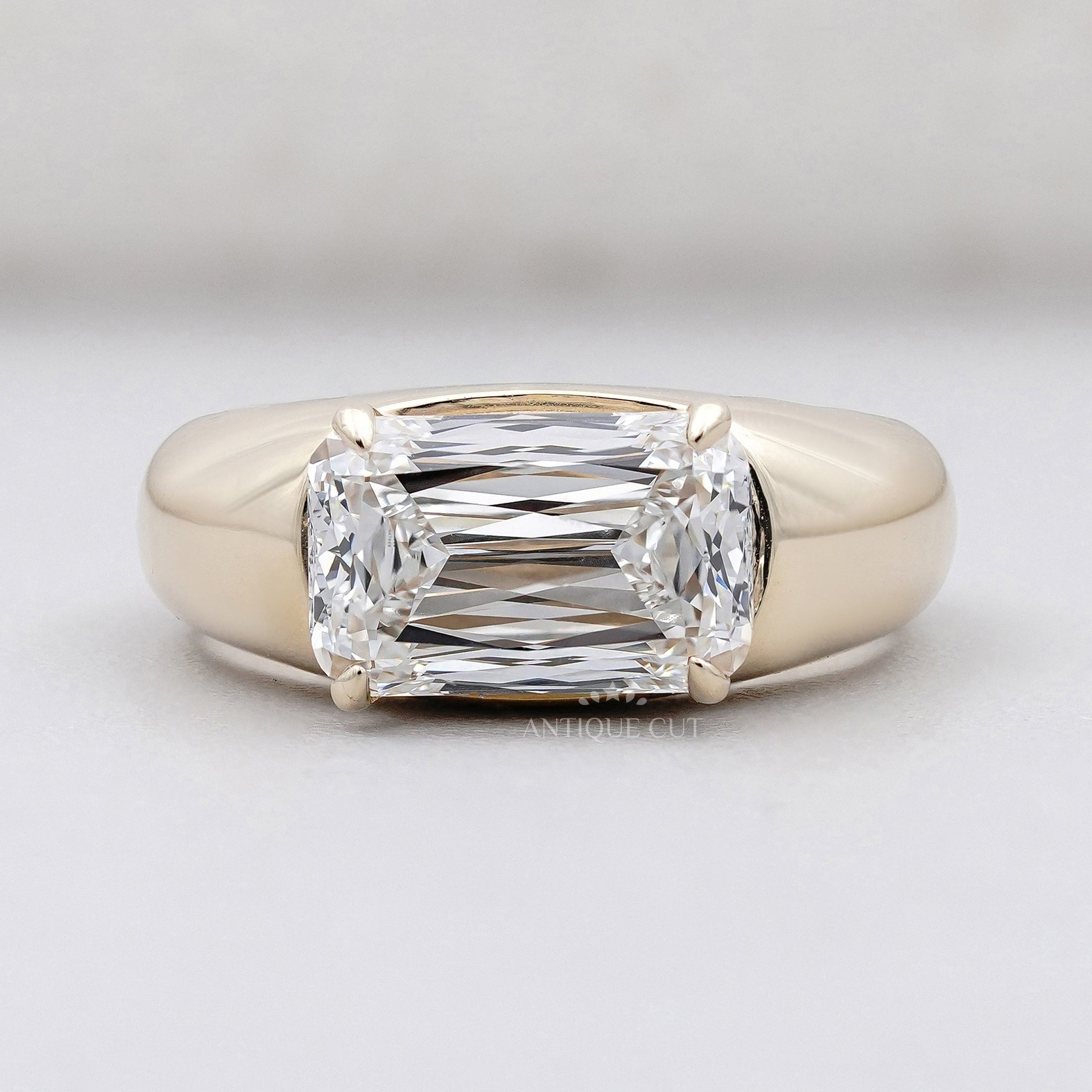Criss cut diamond east west cushion engagement ring