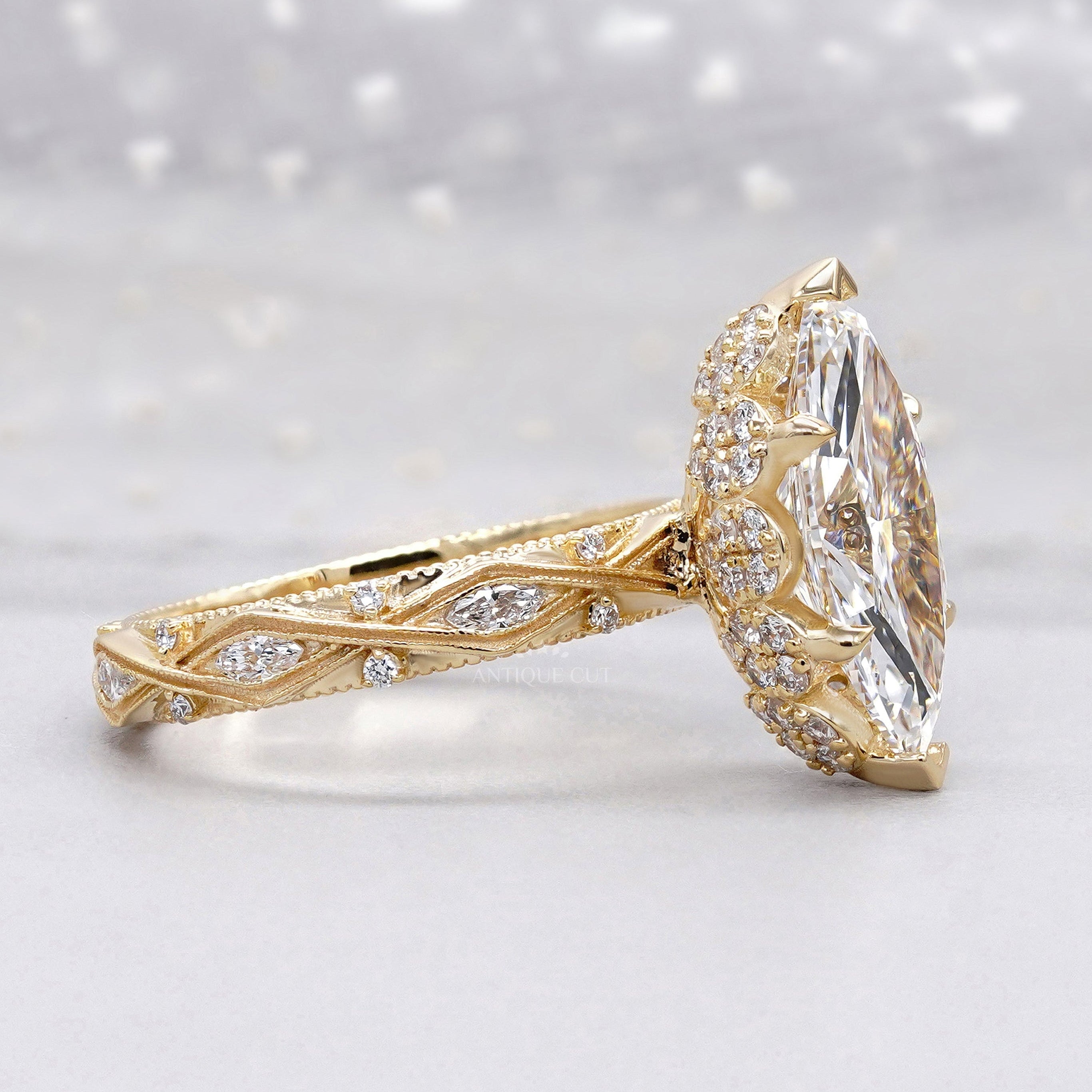 Lab grown marquise cut hidden halo engagement ring