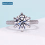 Round brilliant diamond ring with three row pave diamond band in white gold
