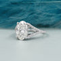White gold oval engagement ring hidden halo style