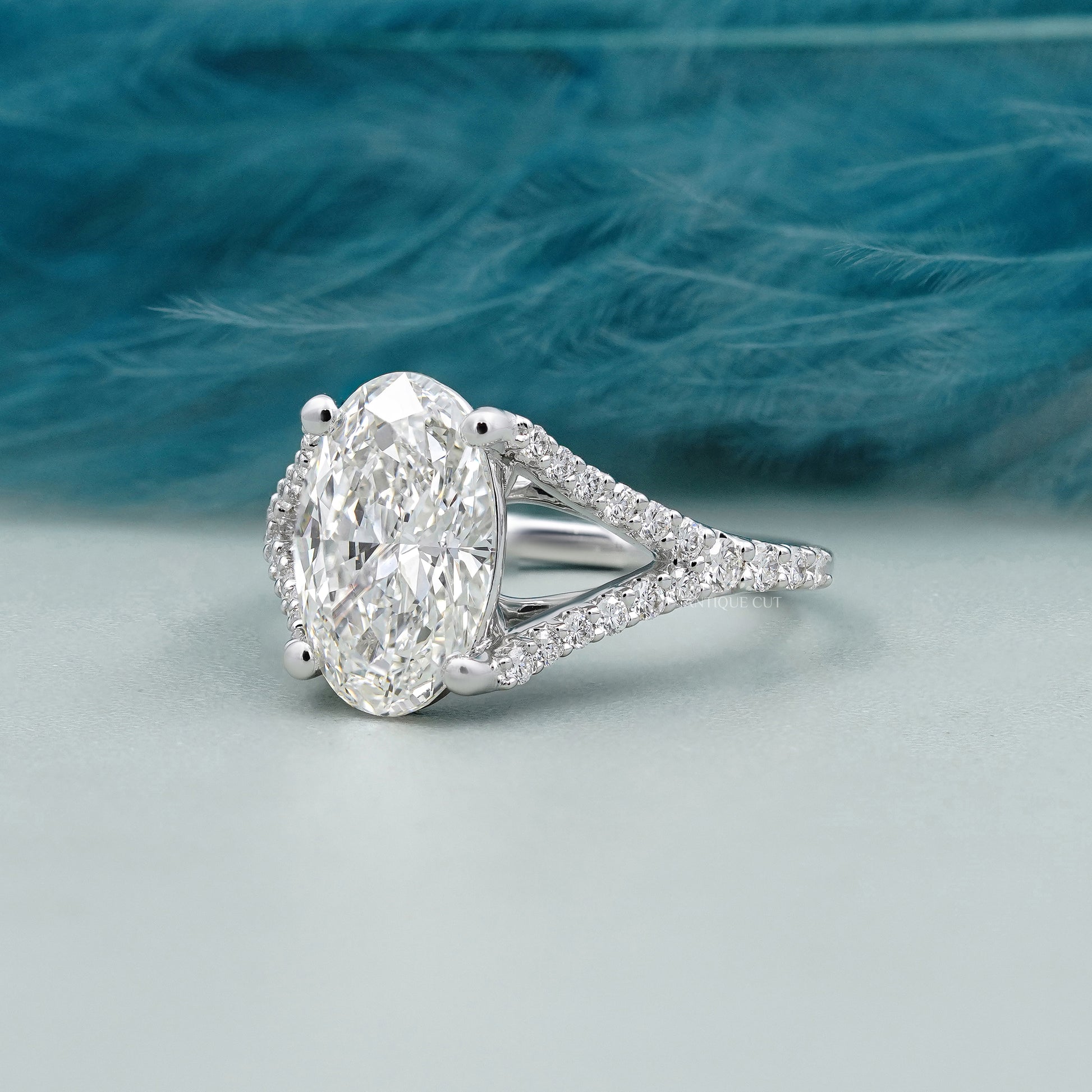 White gold oval engagement ring hidden halo style