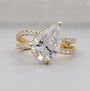Pear cut lab grown diamond ring with pave split shank setting