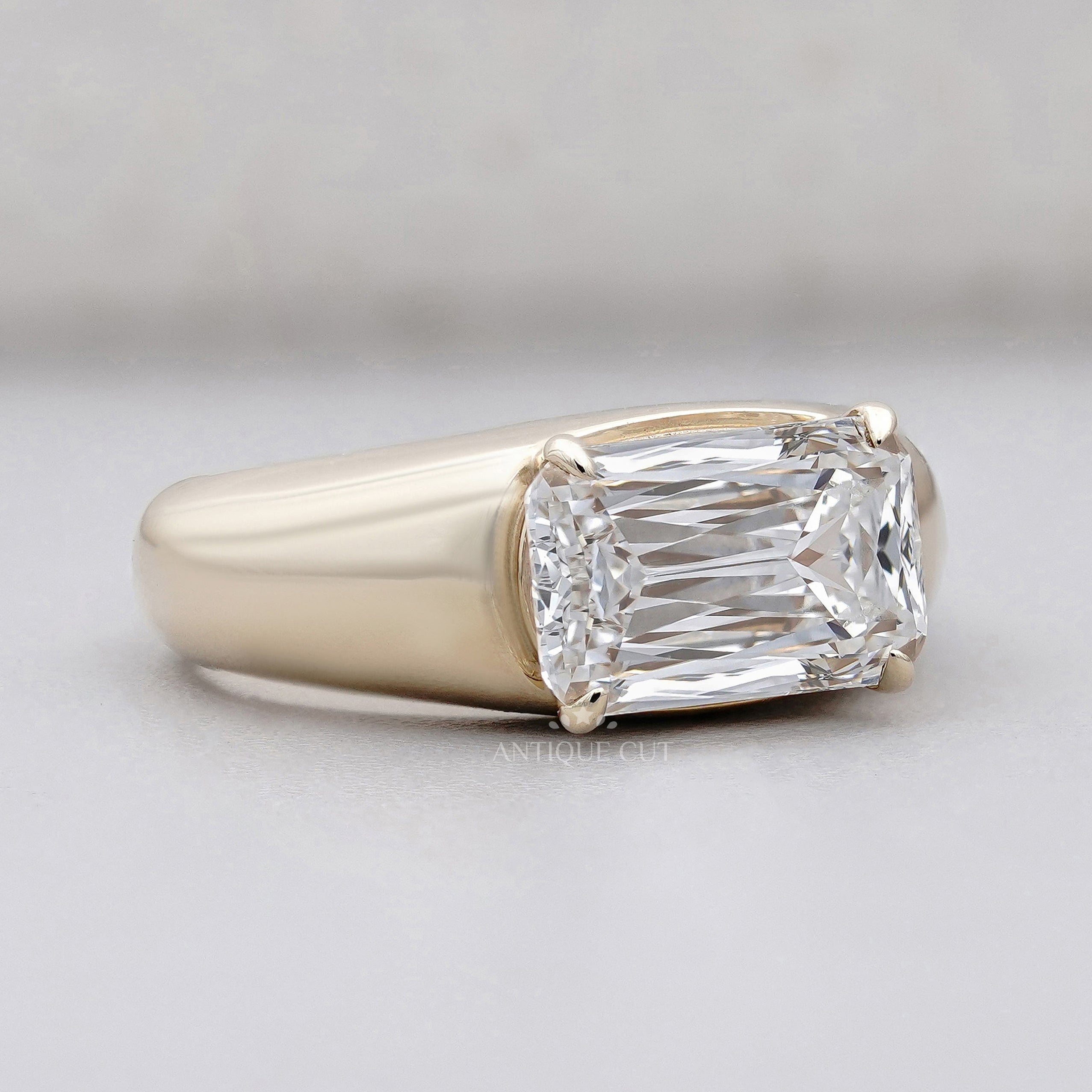 East west cushion criss cut diamond ring white gold