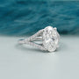 Elegant oval diamond ring with hidden halo