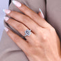 White gold three stone emerald cut engagement ring