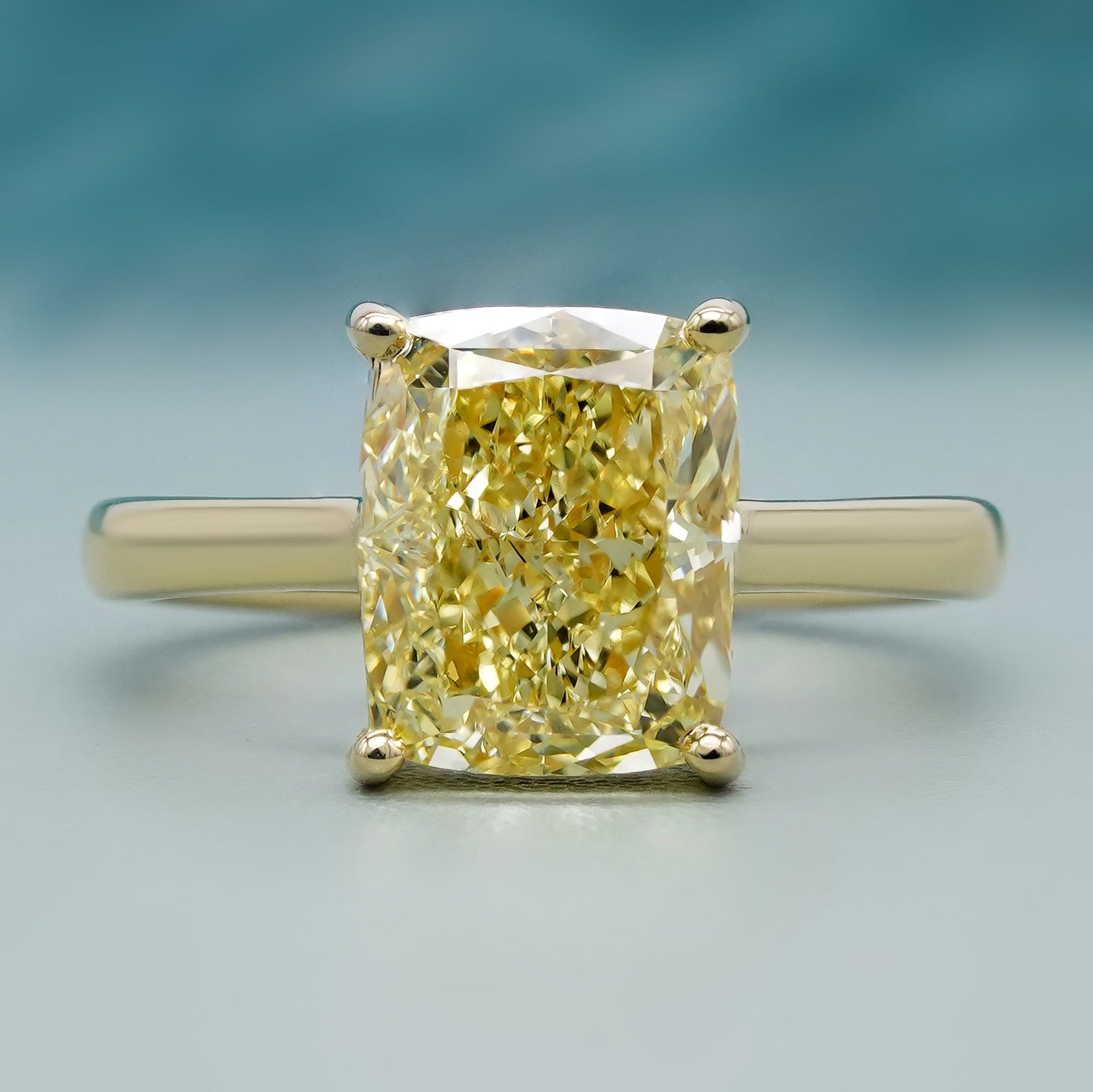 Yellow radiant cut diamond ring 4 prong yellow gold