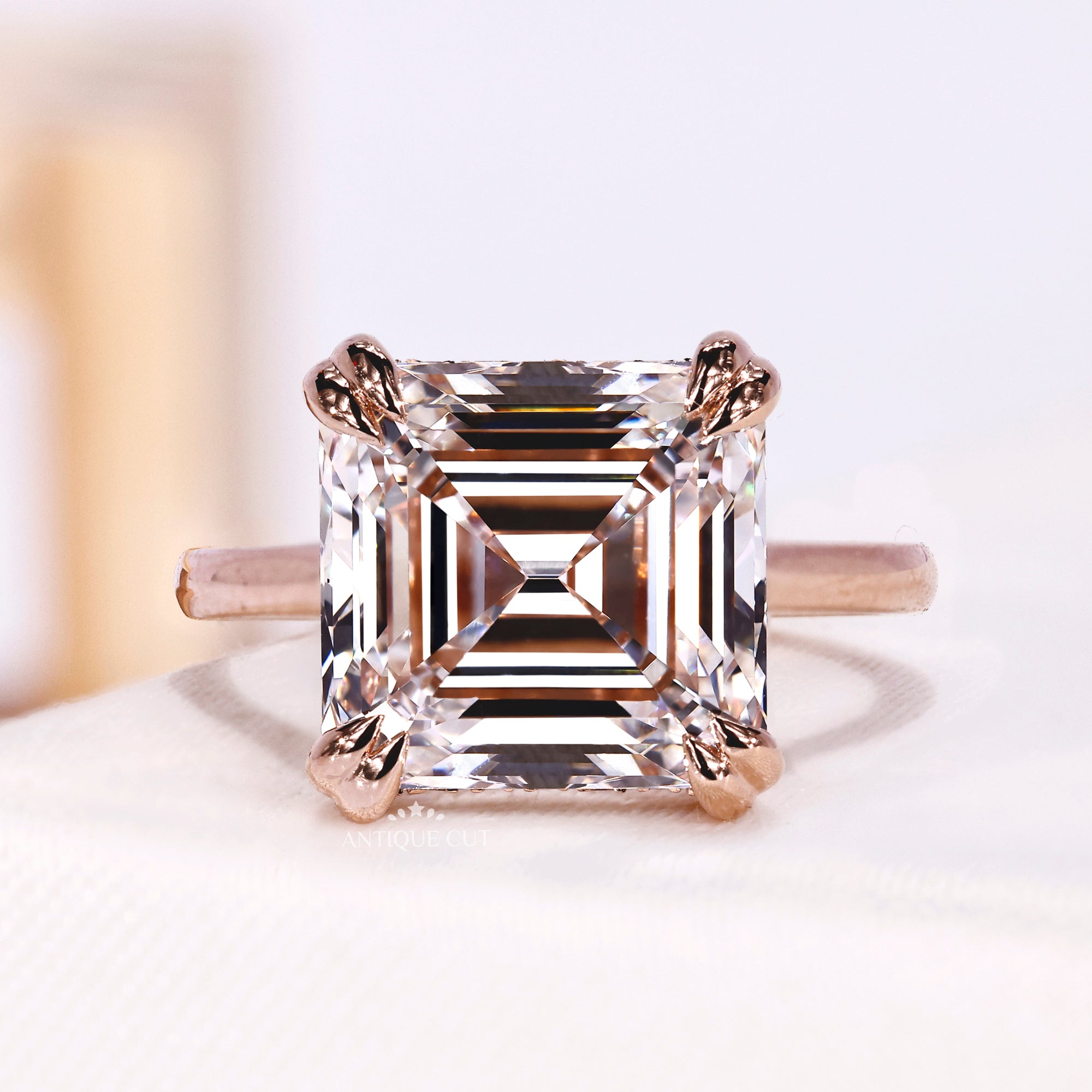 Lab grown Asscher cut solitaire engagement ring with hidden halo