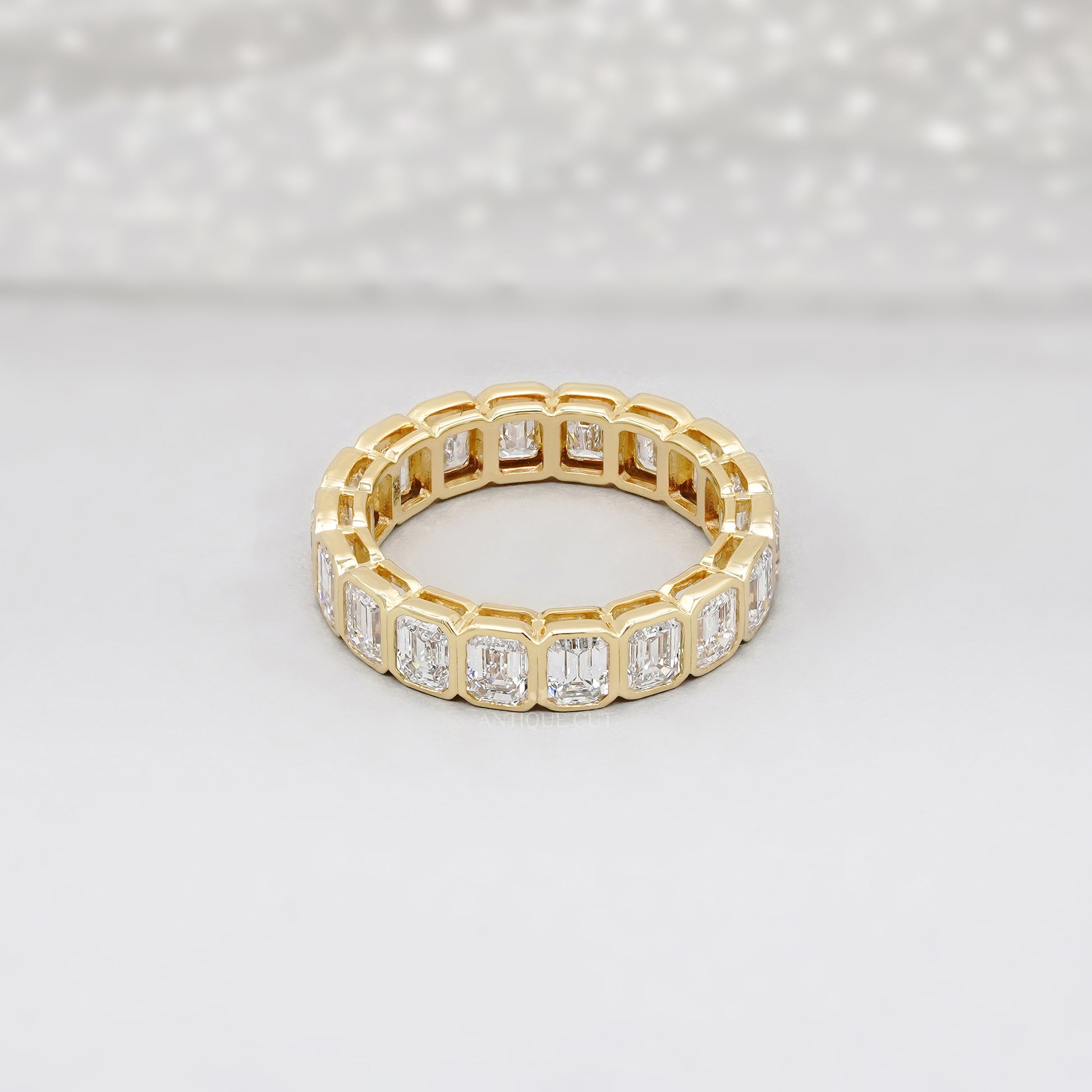 Emerald Cut 3.60tcw Lab Diamond Eternity Band | IGI Certified | Yellow Gold