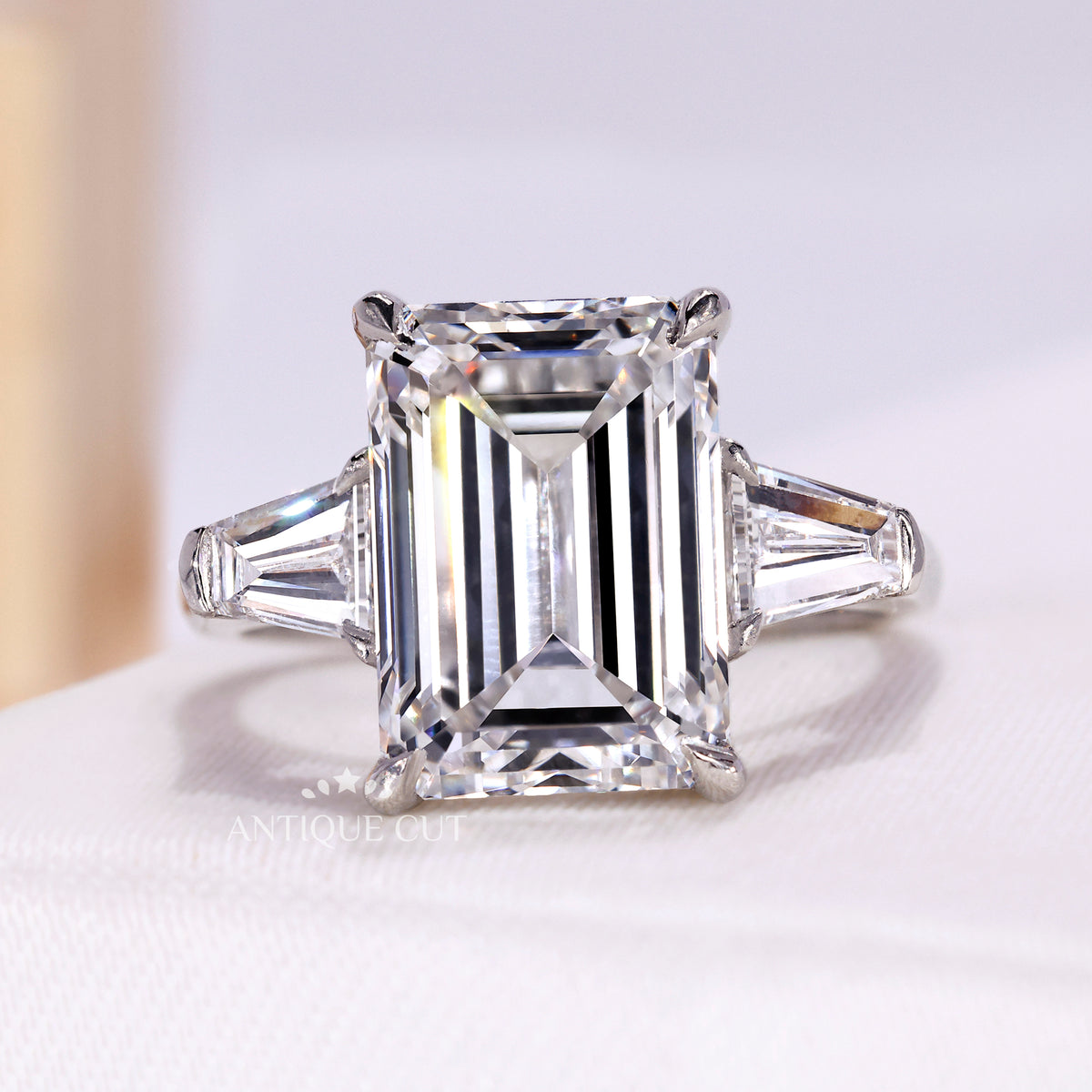 Emerald cut lab grown diamond ring with baguette side stones