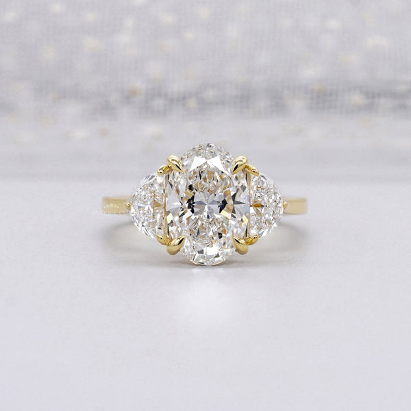 Oval Cut Ring with Half Moon Side stone gold ring