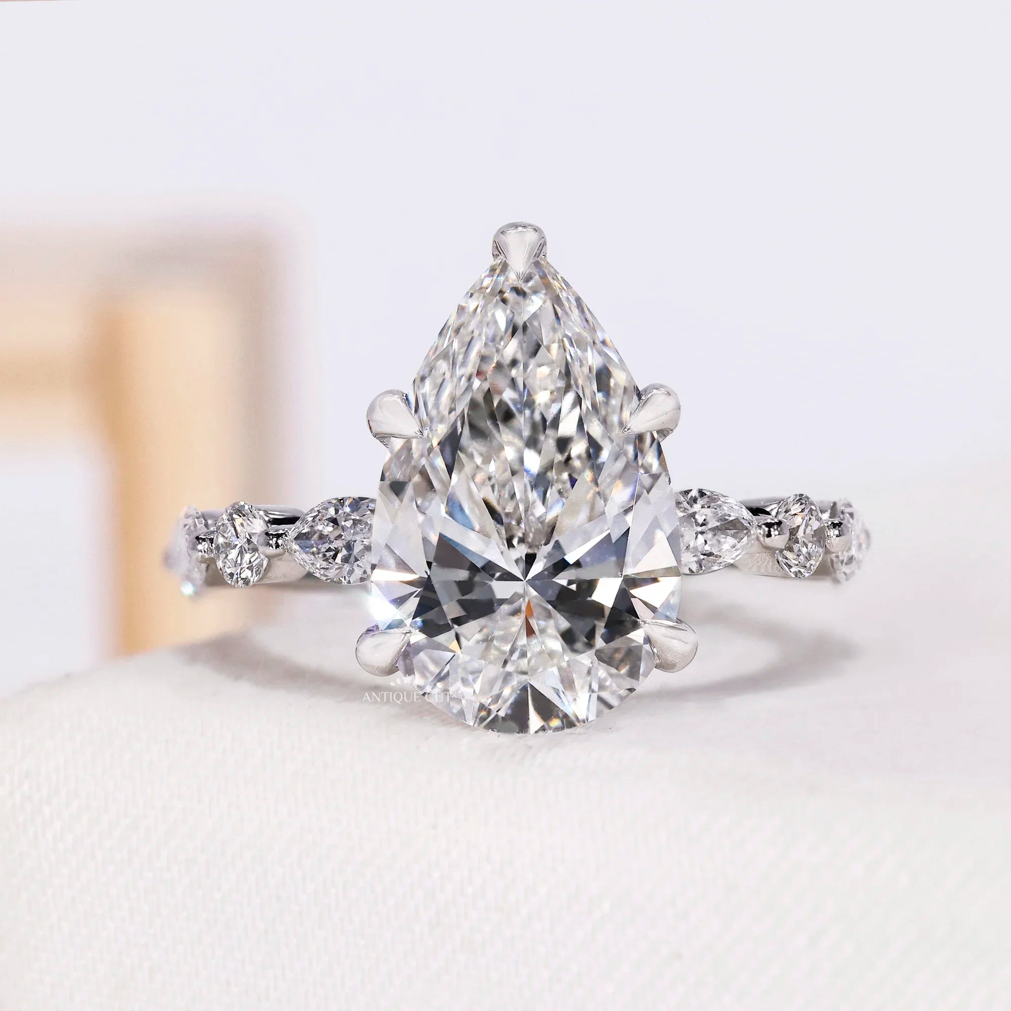 4.00 Carat Pear Lab Grown Diamond Ring With Side Stone | IGI Certified
