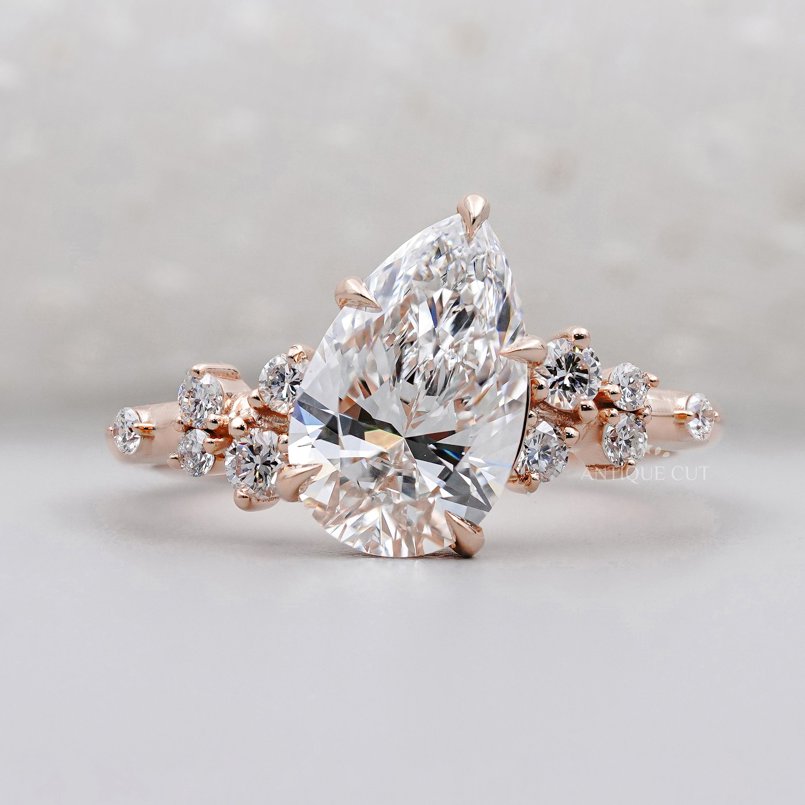 Pear Cluster Engagement Ring in rose gold