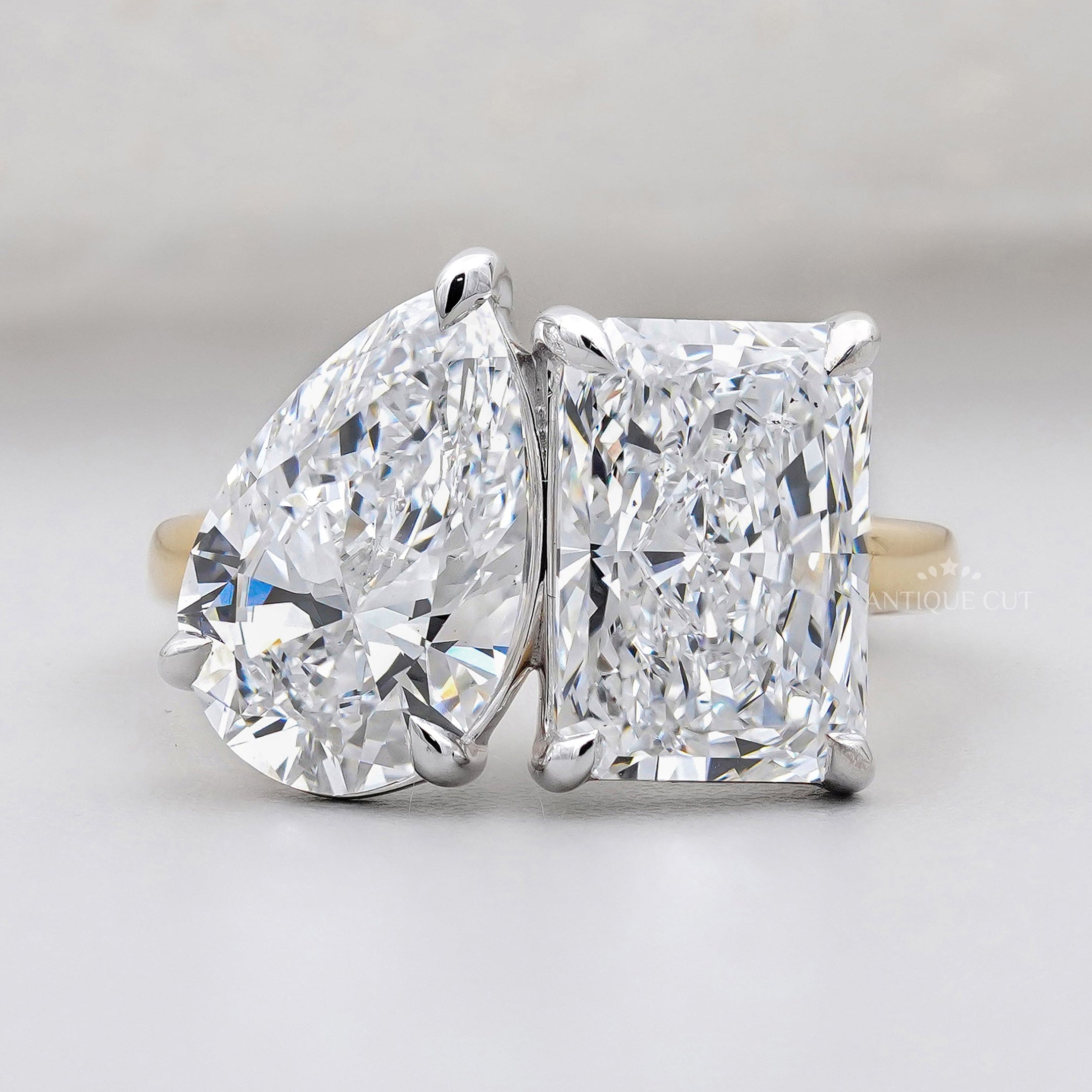 Toi Et Moi ring radiant and pear two tone yellow gold