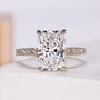 Radiant cut diamond ring with hidden halo and pave band