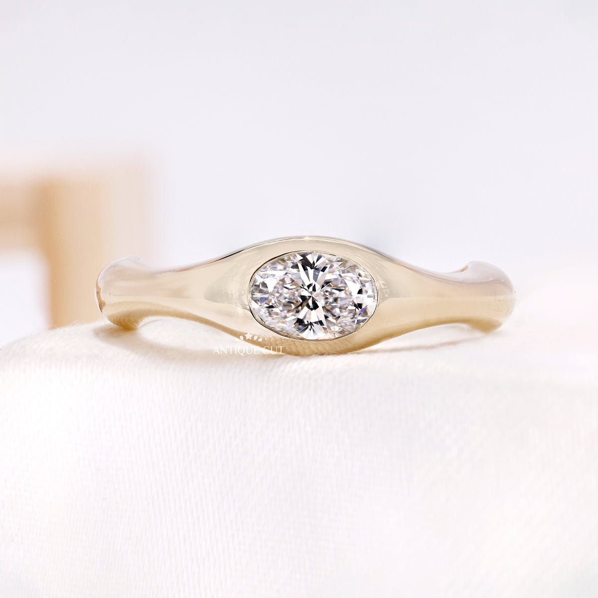 0.50 Carat East West Oval Lab Grown Diamond Bezel Set Engagement Ring