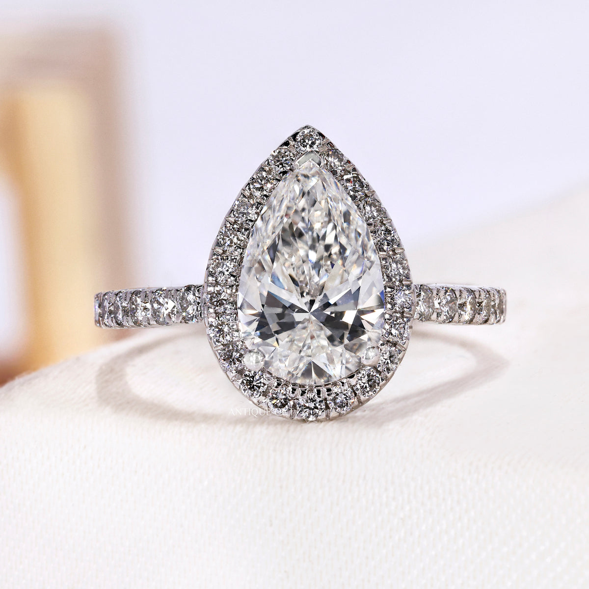 1.50 Carat Pear Shaped Halo Engagement Ring With Pave Band | IGI Certified
