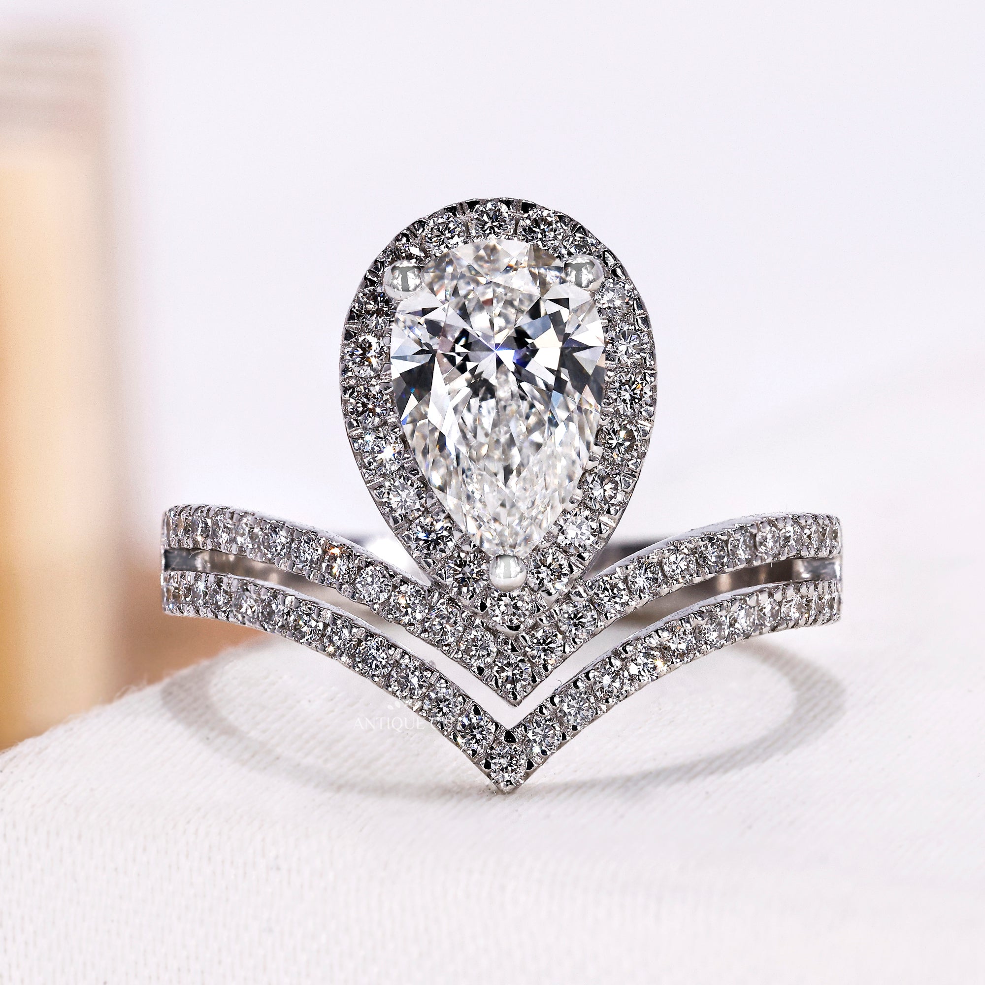 Pear Cut Diamond Engagement Ring with Halo Design in White Gold
