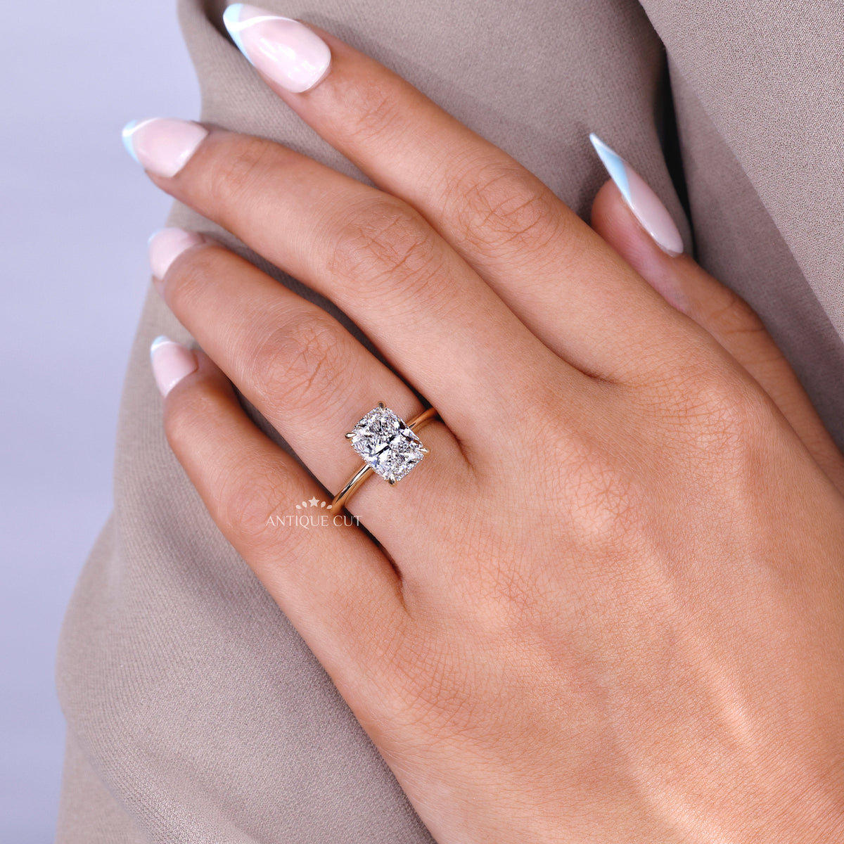 Yellow gold elongated cushion cut diamond ring