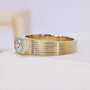 IGI certified emerald cut diamond engagement ring in yellow gold