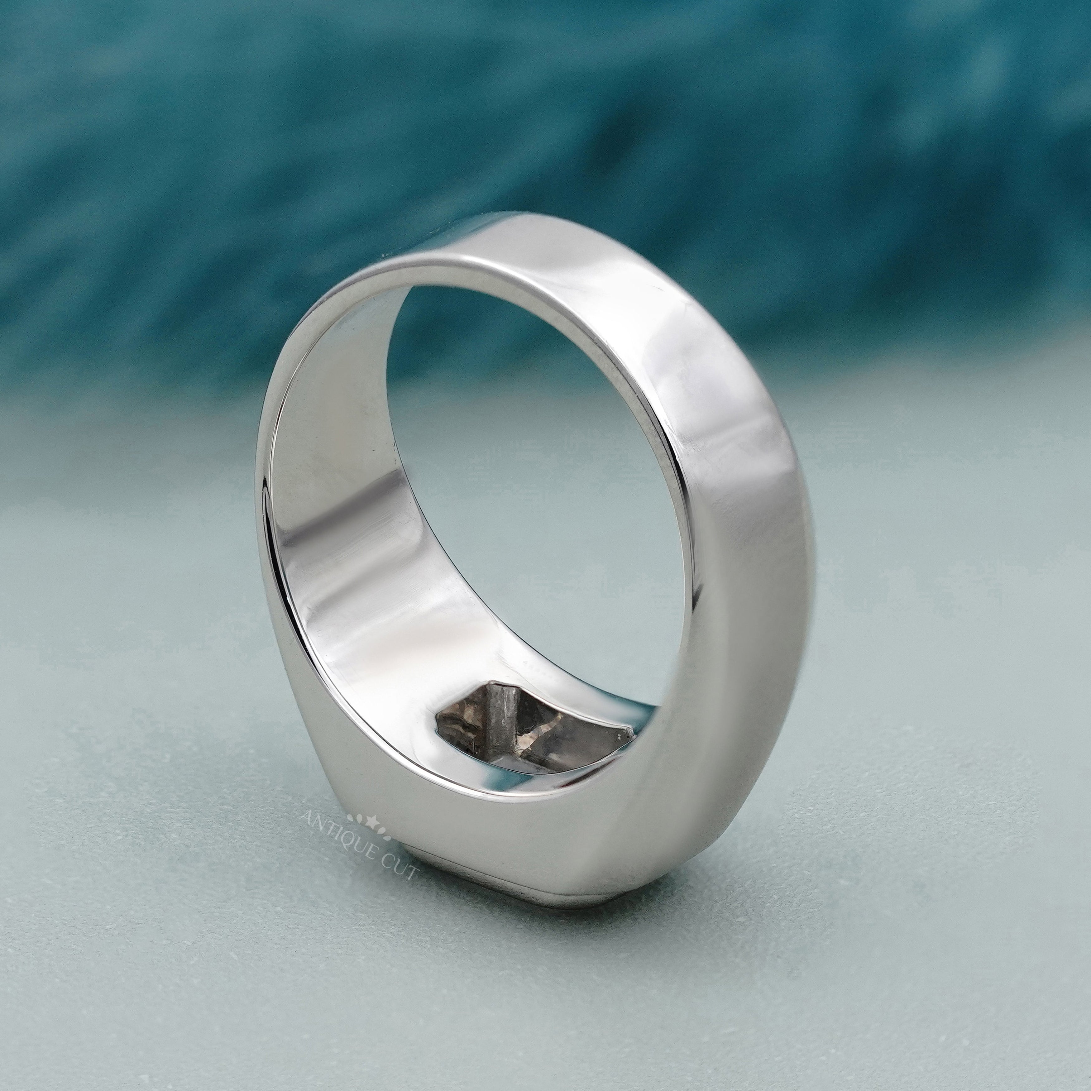 White gold east west emerald cut diamond ring