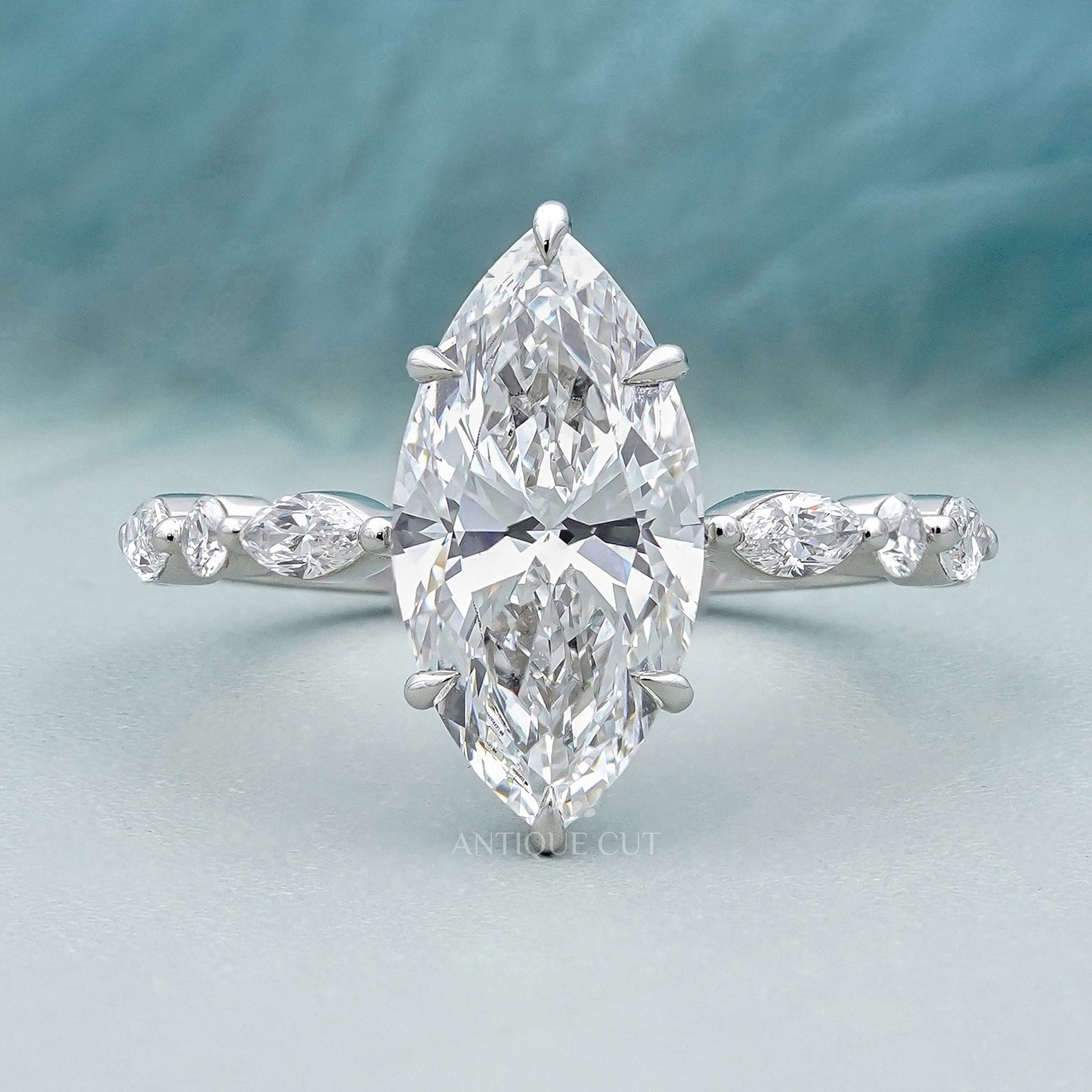 Hidden halo marquise engagement ring in white gold