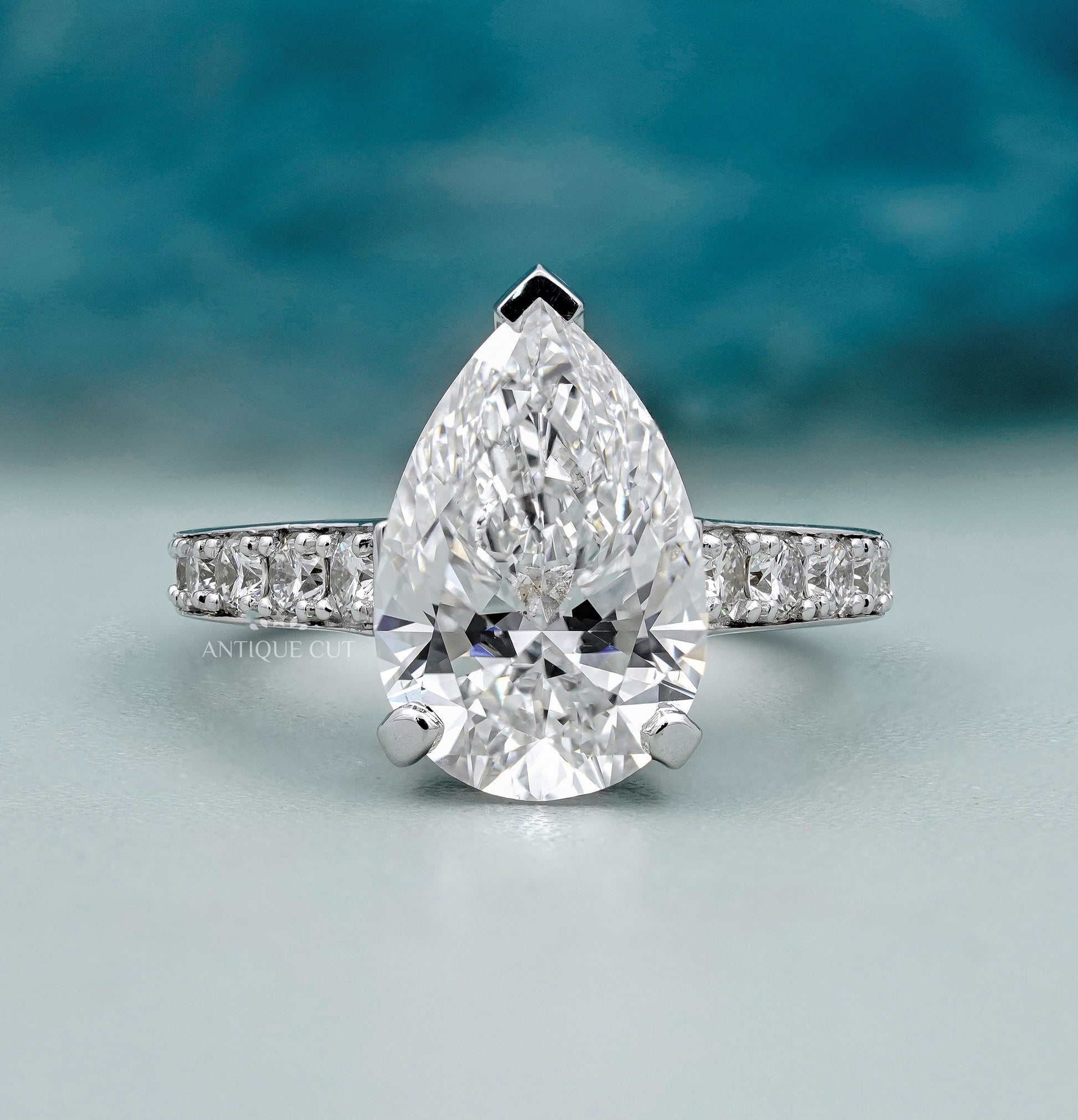 Pear Shaped Engagement Ring with Pave Band
