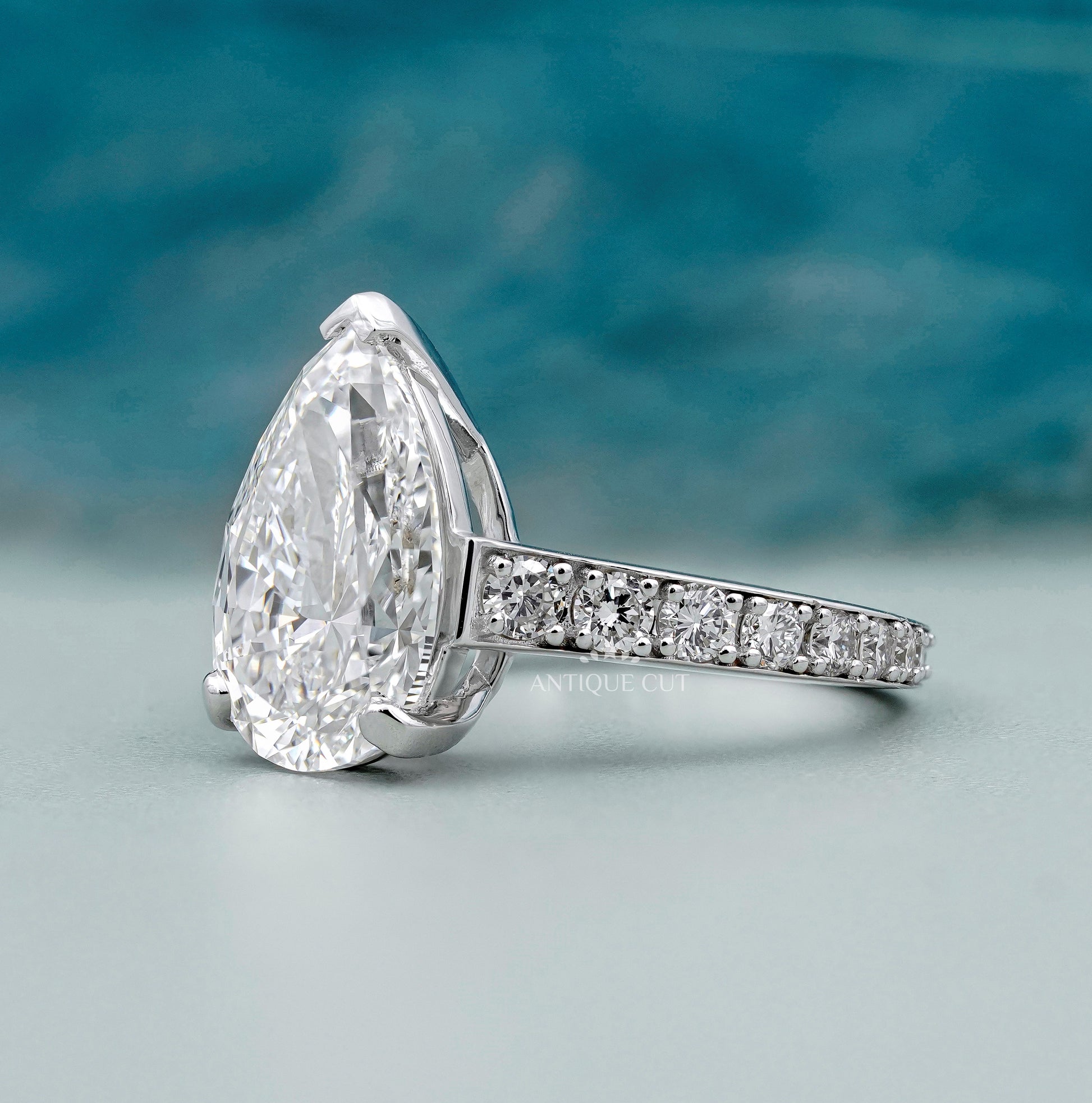 Pear Shaped Engagement Ring with Pave Band