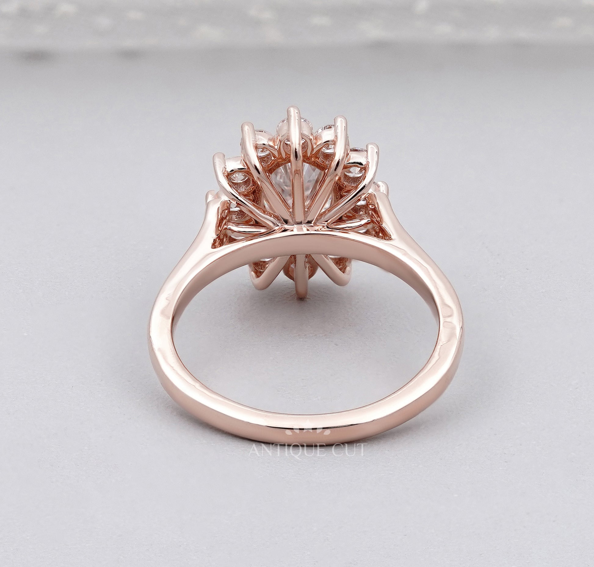Oval Rose Gold Halo Engagement Ring With Floral Style Round Diamond Accent | IGI Certified