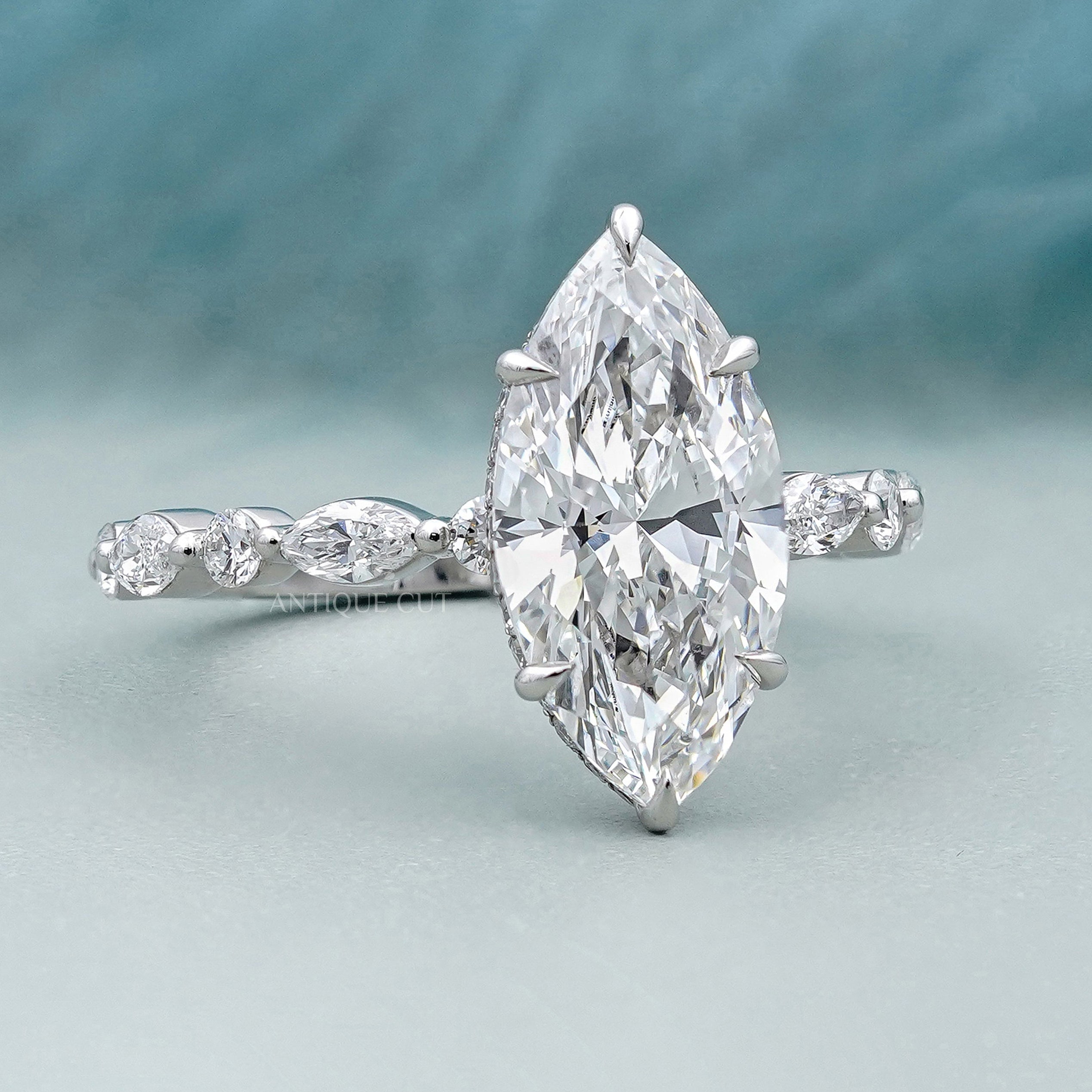 Lab grown marquise hidden halo engagement ring
