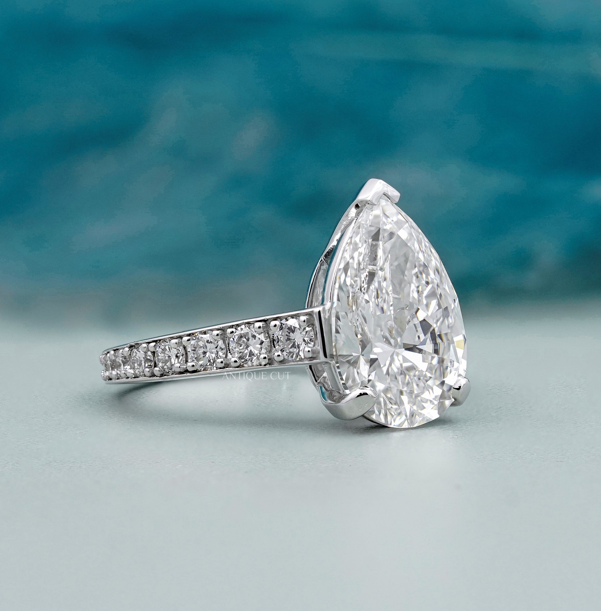 Pear Shaped Engagement Ring with Pave Band