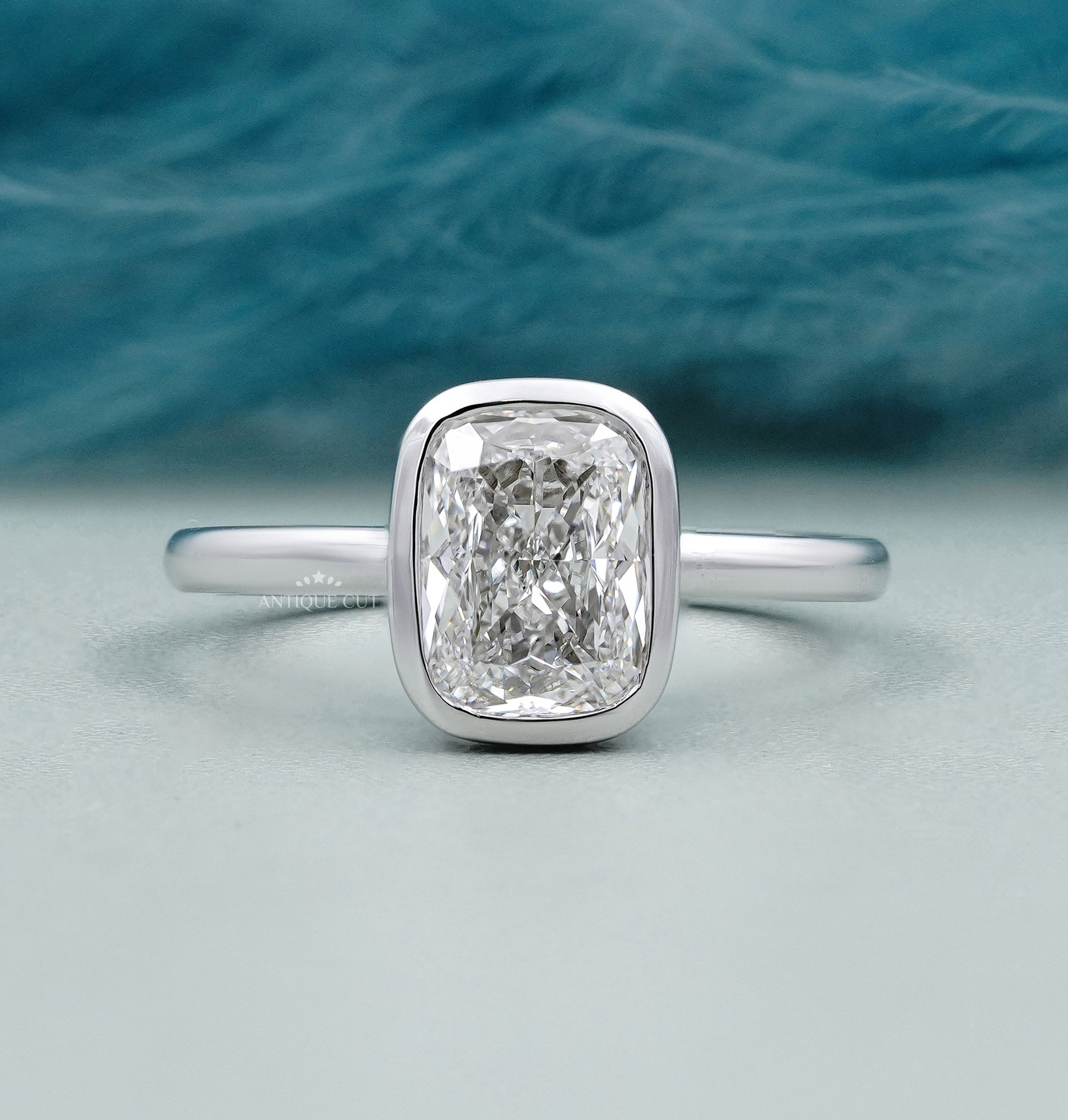 Cushion Cut Solitaire Engagement Ring with Bezel Setting