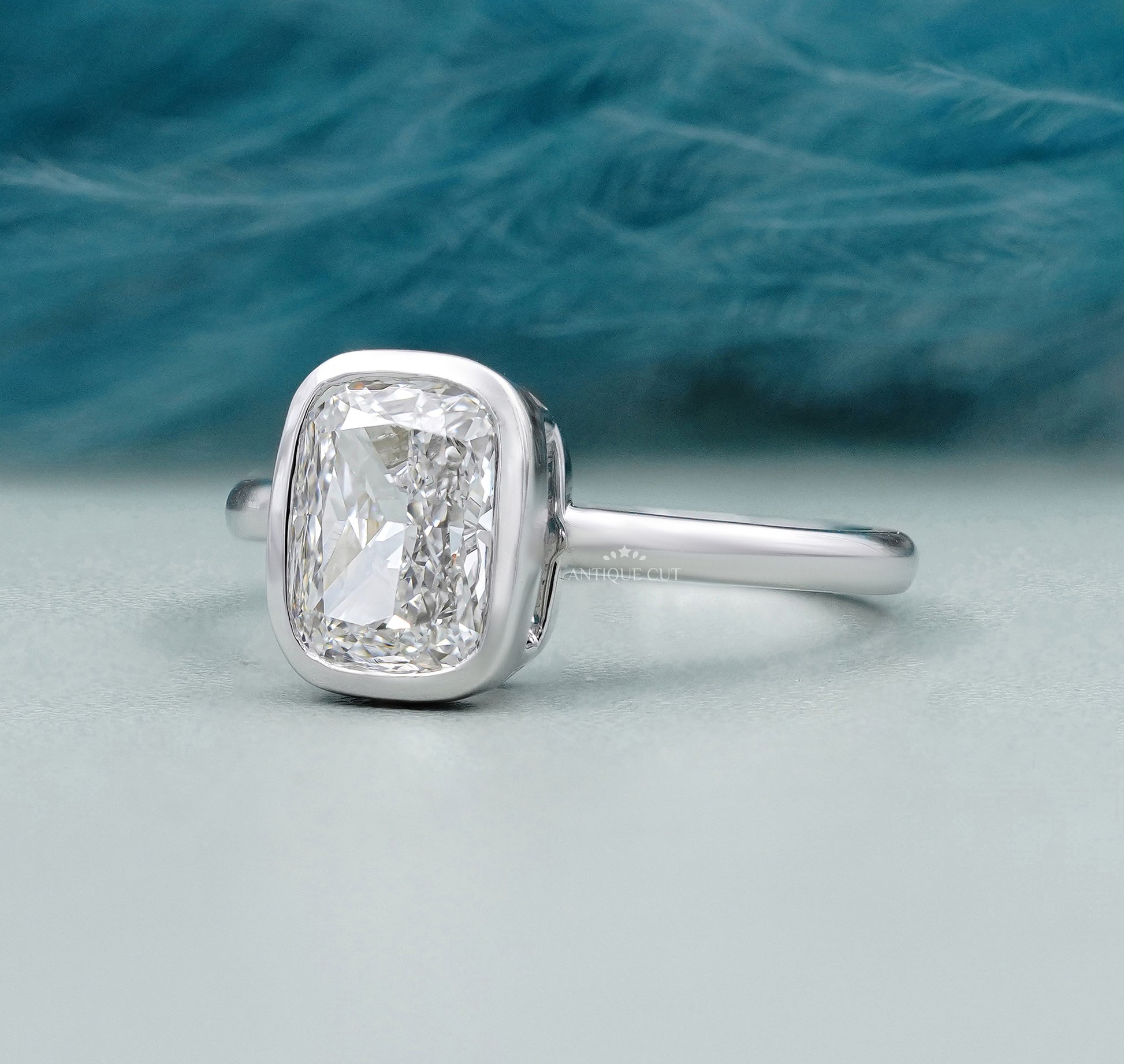 Cushion Cut Solitaire Engagement Ring with Bezel Setting