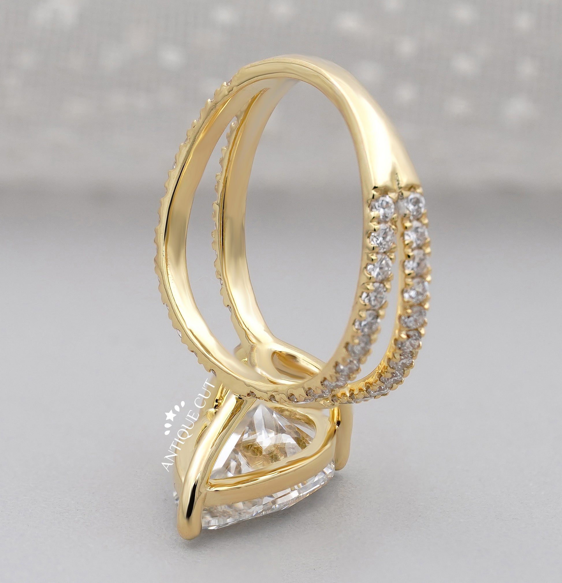 Split shank pear cut engagement ring with IGI certified diamond