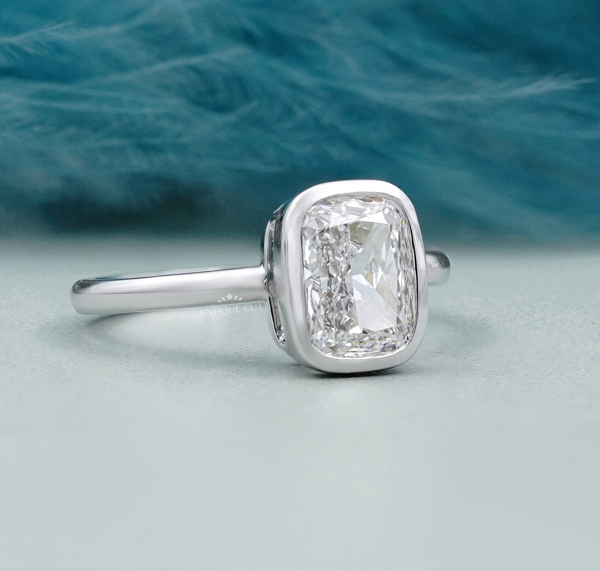 Cushion Cut Solitaire Engagement Ring with Bezel Setting