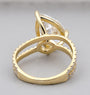 Pave diamond ring featuring pear cut center diamond design