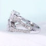 White gold butterfly engagement ring with pave band