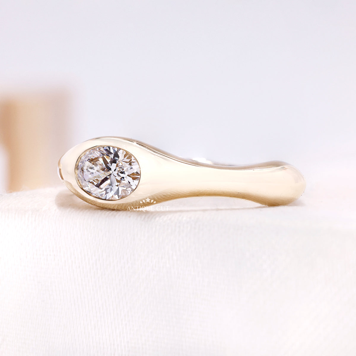 0.50 Carat East West Oval Lab Grown Diamond Bezel Set Engagement Ring