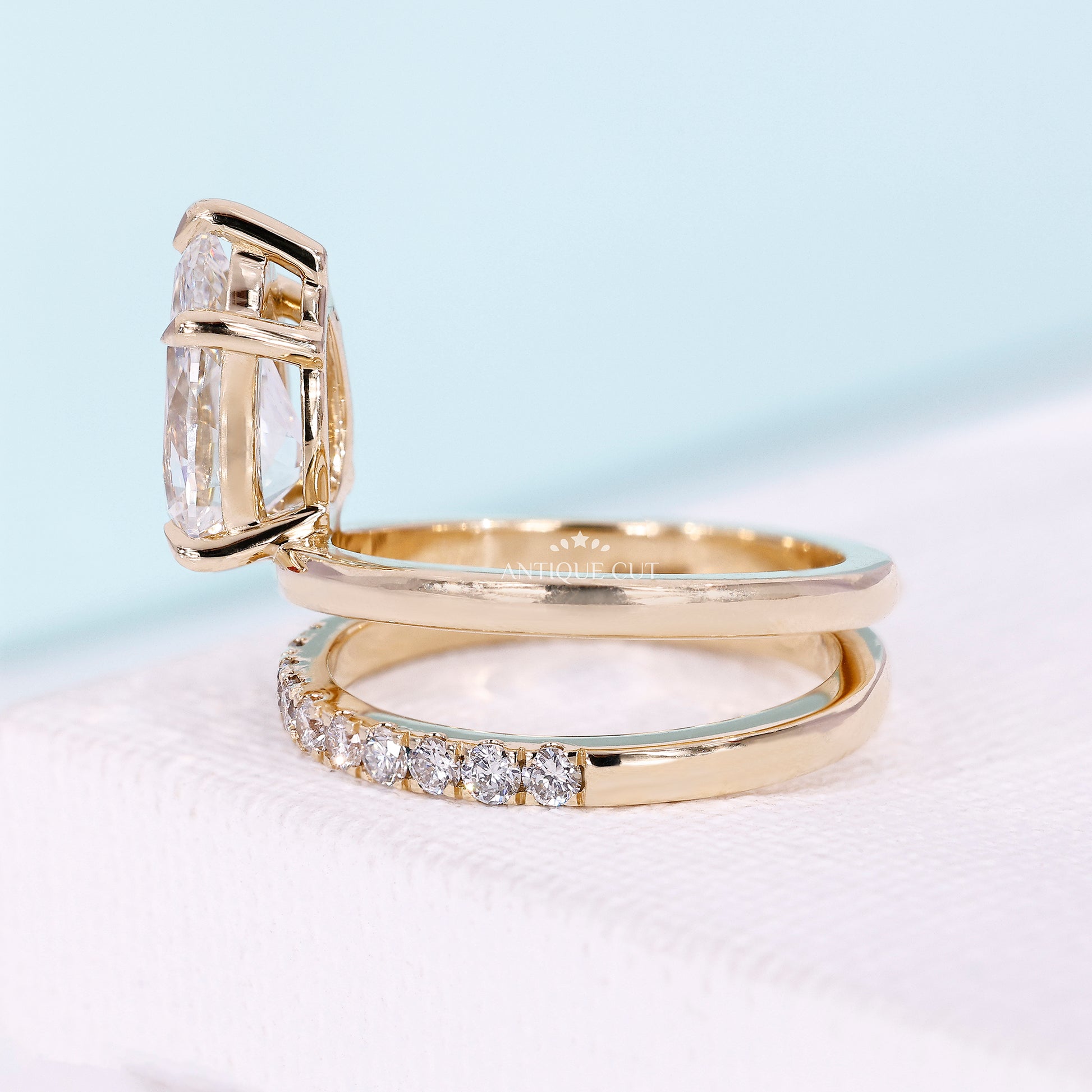 Five claw prong pear-cut diamond engagement ring
