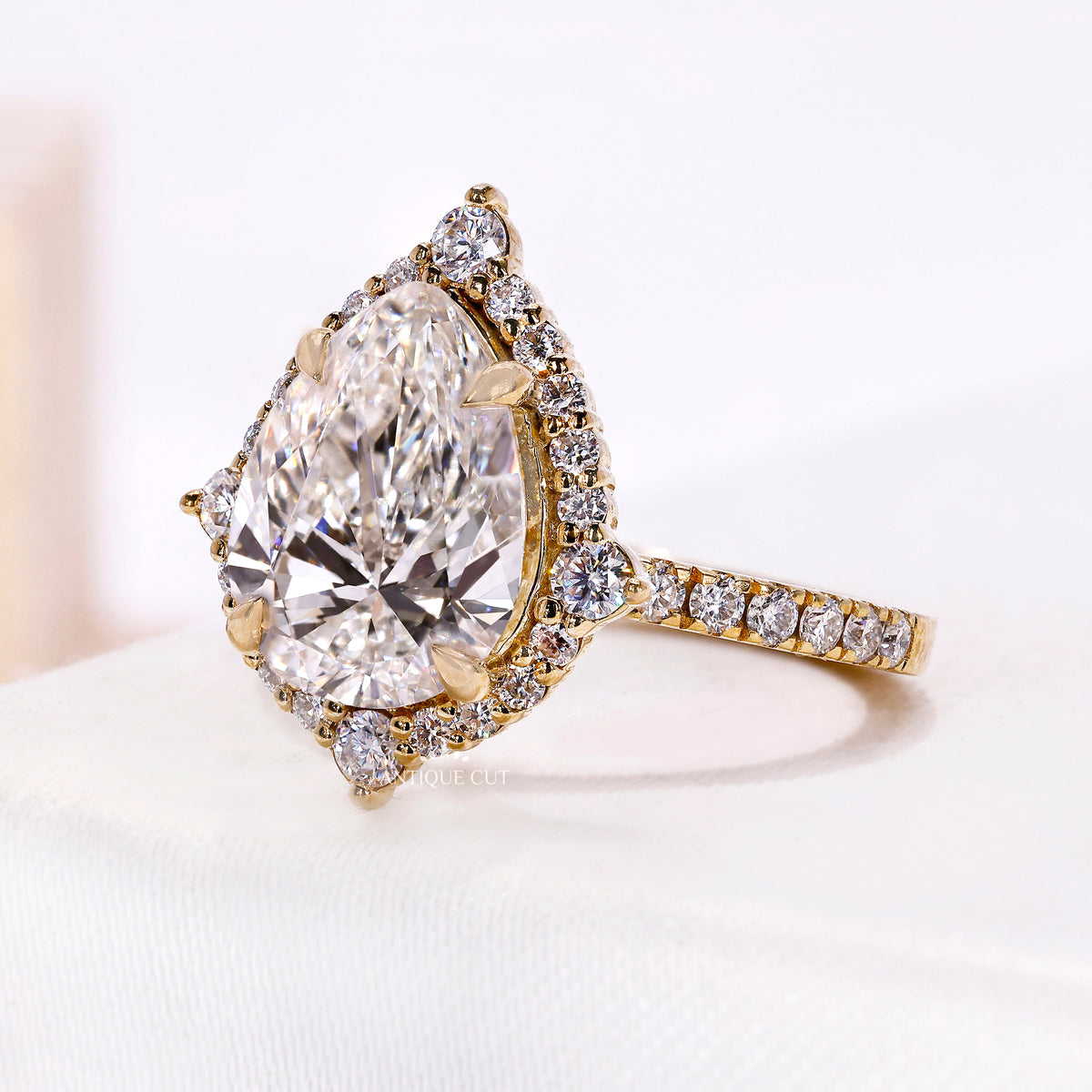 3.50 Carat Pear Cut Diamond Engagement Ring With Halo and Pave Band