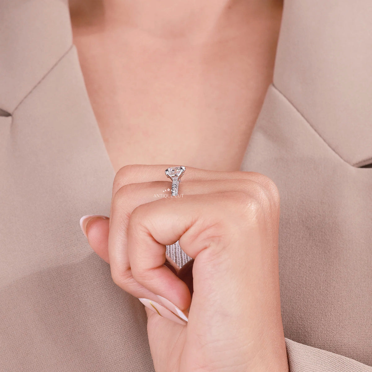 Round shape diamond ring with four prong setting and white gold band