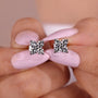White gold earrings with round cut diamonds