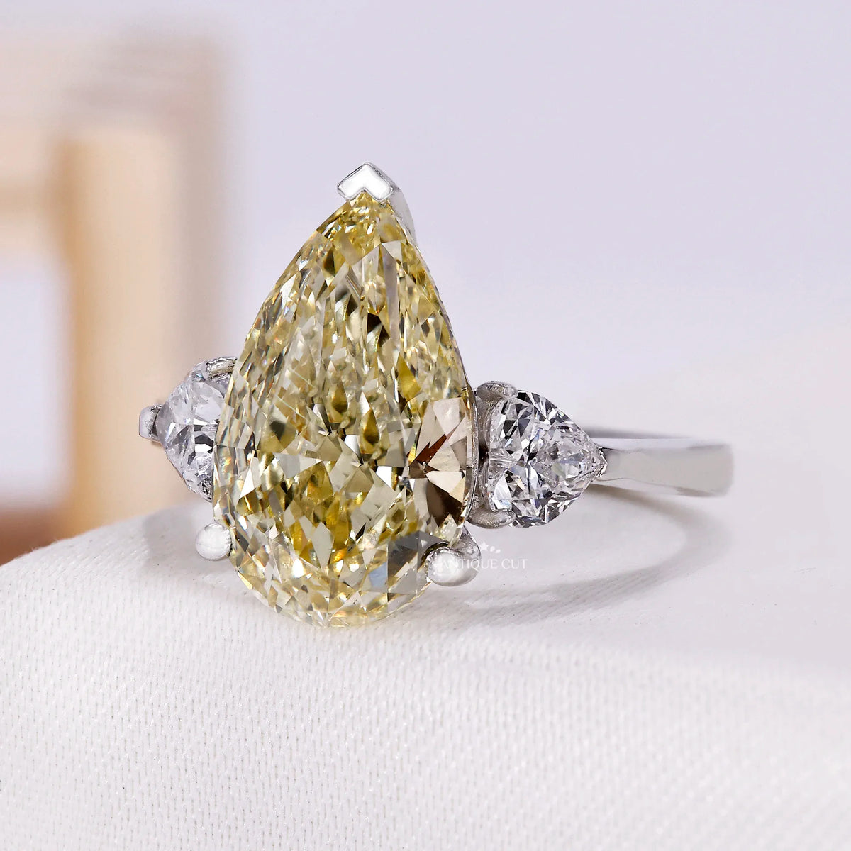 Yellow pear diamond engagement ring in white gold